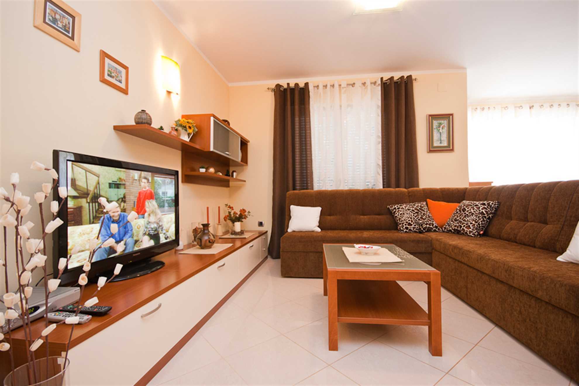 Apartment Lovorka 1 with terrace and barbeque