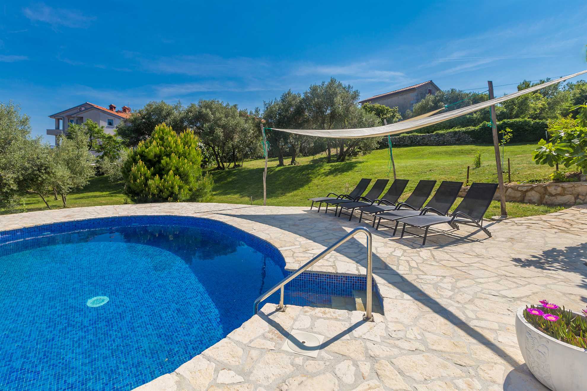 Ferienhaus JELE mit Pool