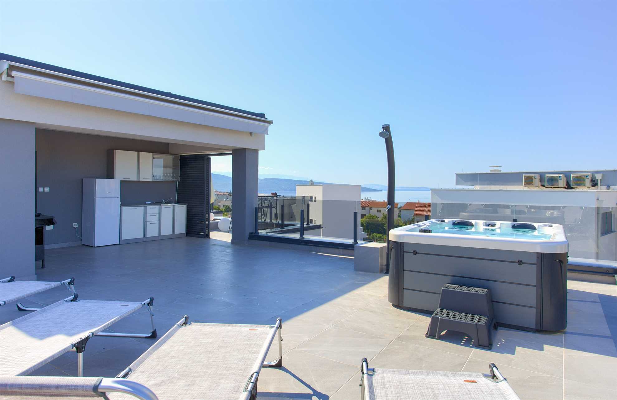 Apartment JOY with sea view and hot tub