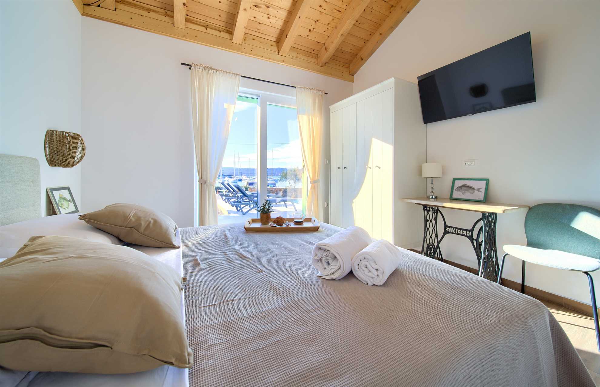 Vila BEACHFRONT s grijanim bazenom