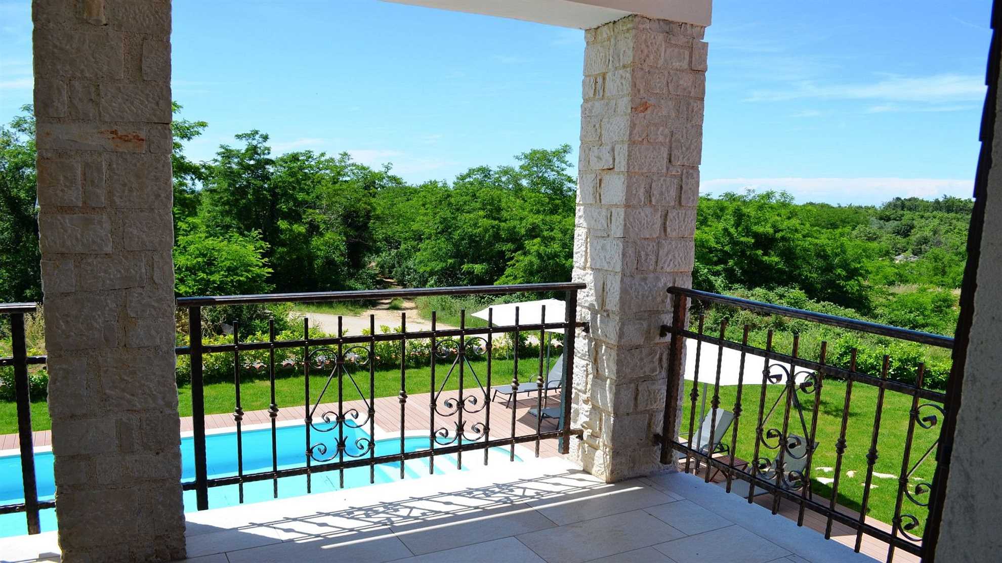 Spacious poolside villa with beautiful garden