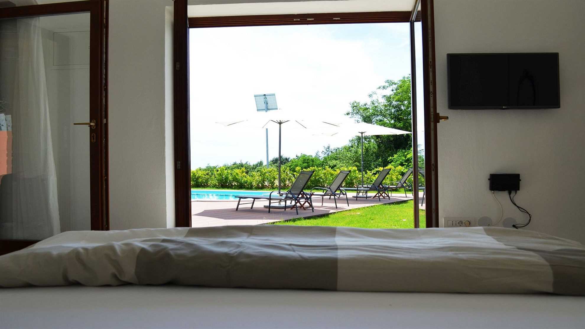 Spacious poolside villa with beautiful garden