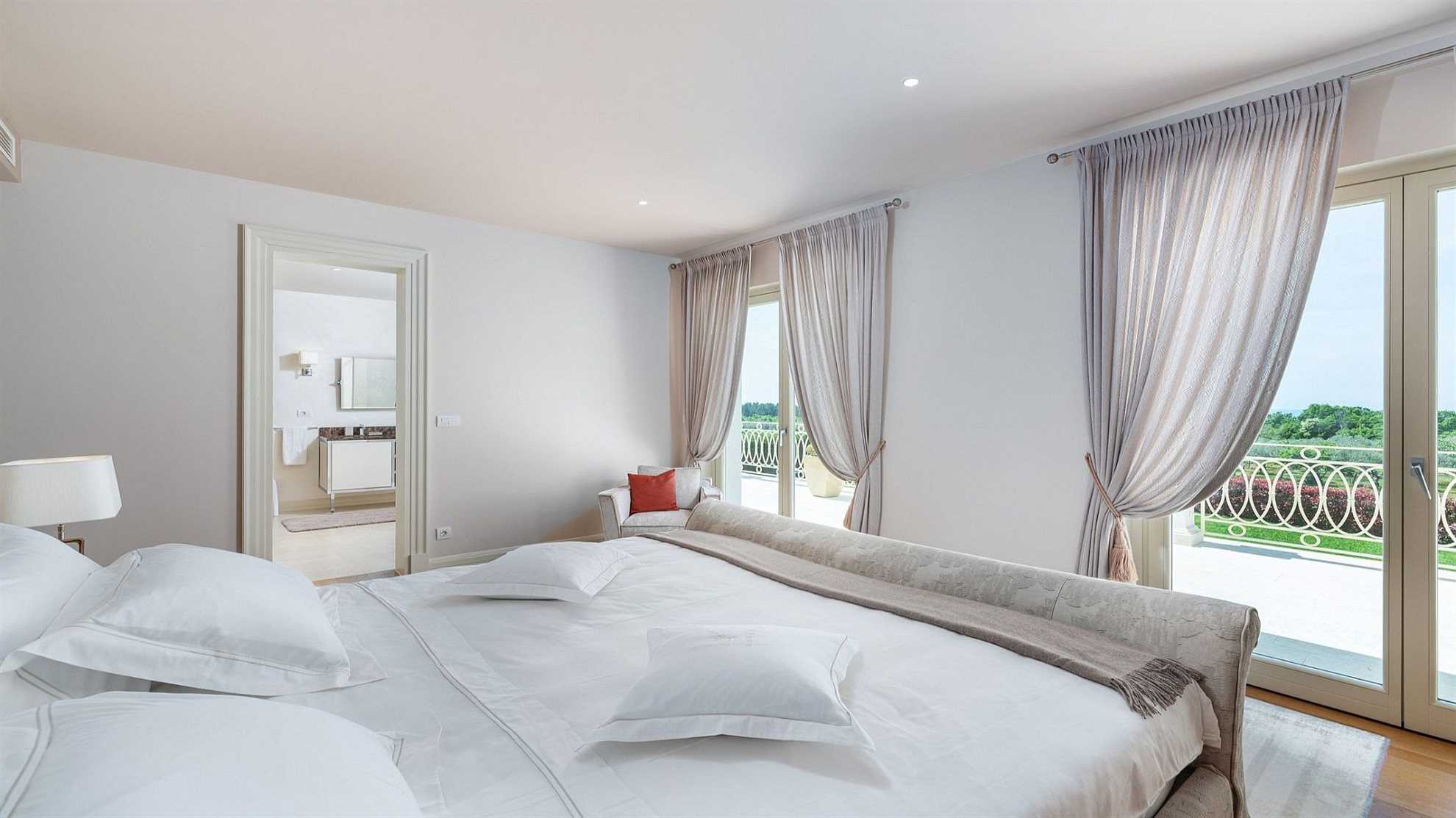 A modern villa in Vabriga with a pool and a graden