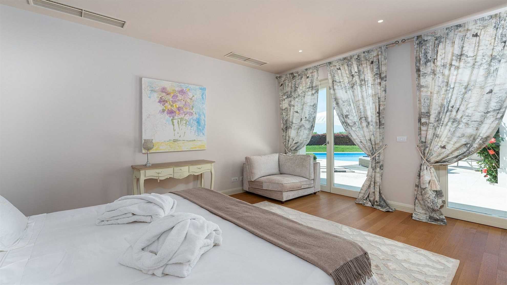 A modern villa in Vabriga with a pool and a graden