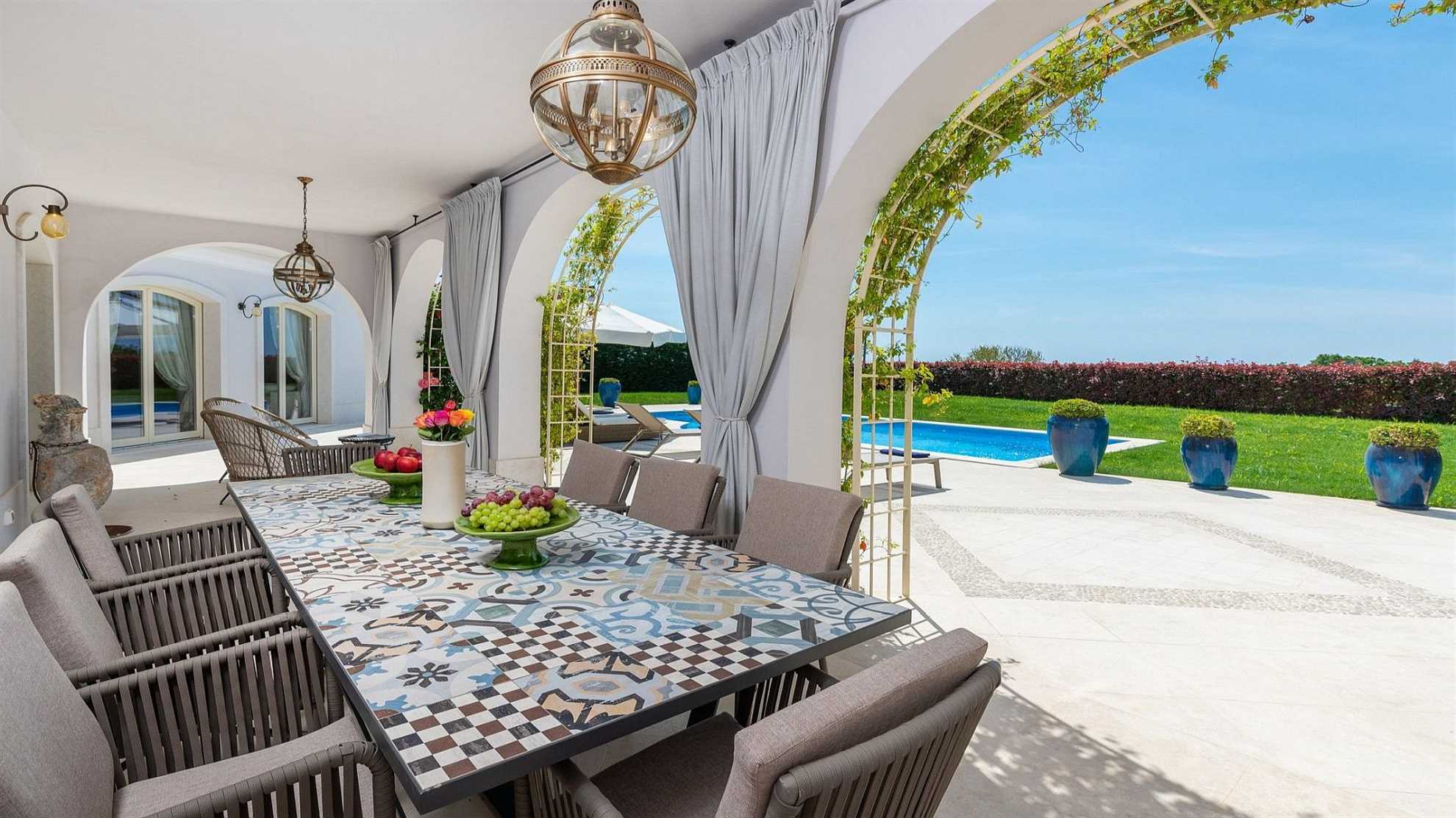 A modern villa in Vabriga with a pool and a graden
