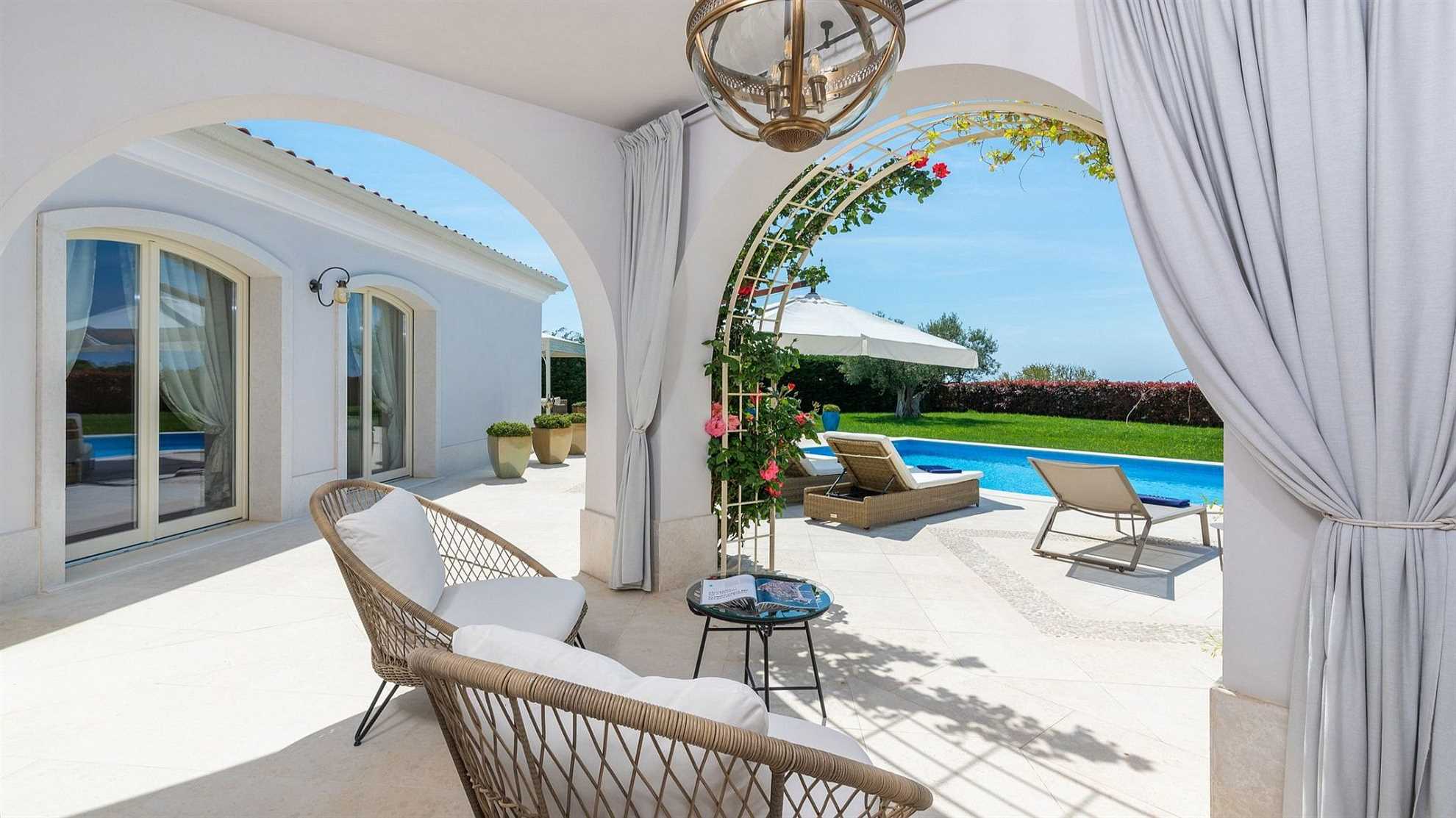 A modern villa in Vabriga with a pool and a graden