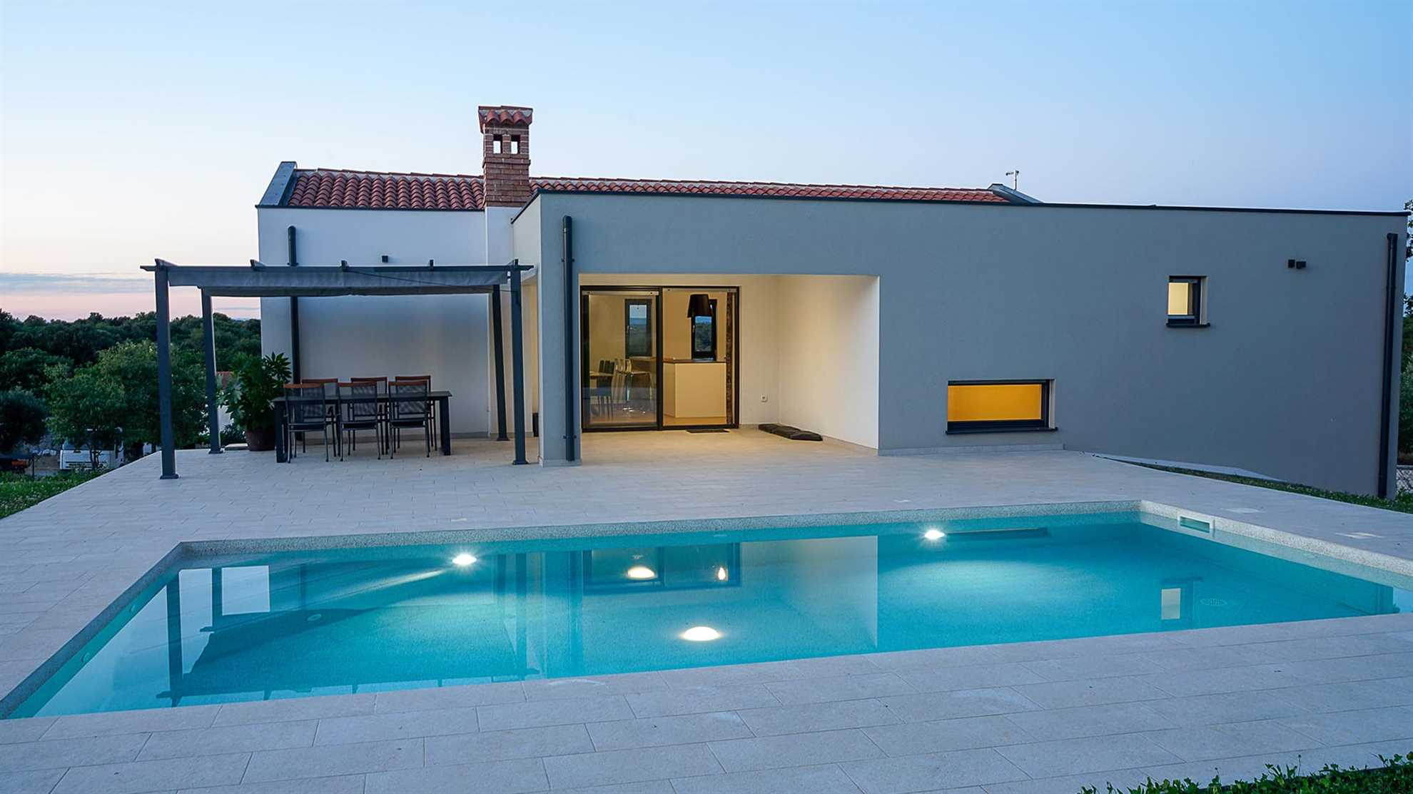 A contemporary villa with a great swimming pool