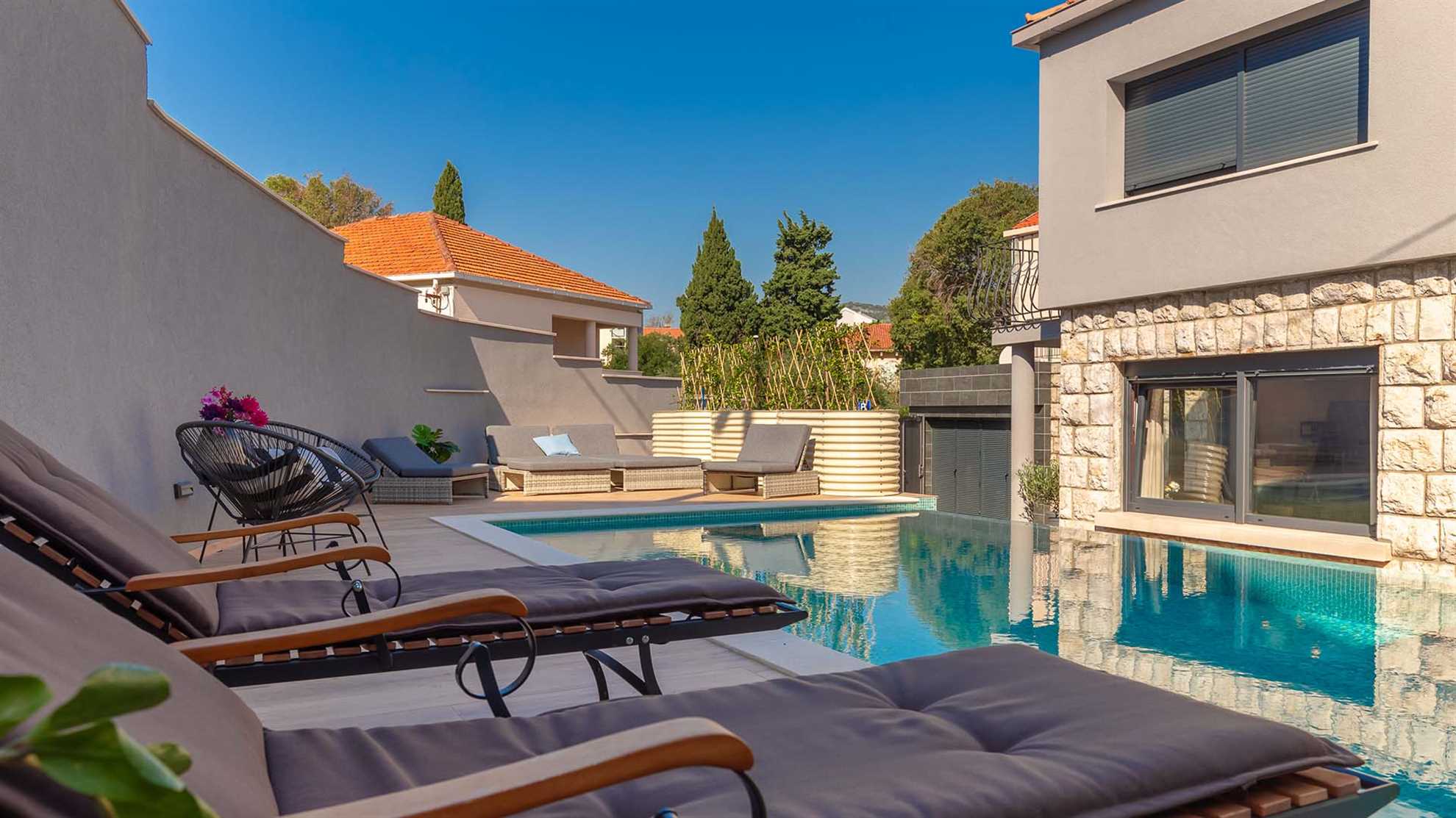A modern vacation house in Dubrovnik with a pool