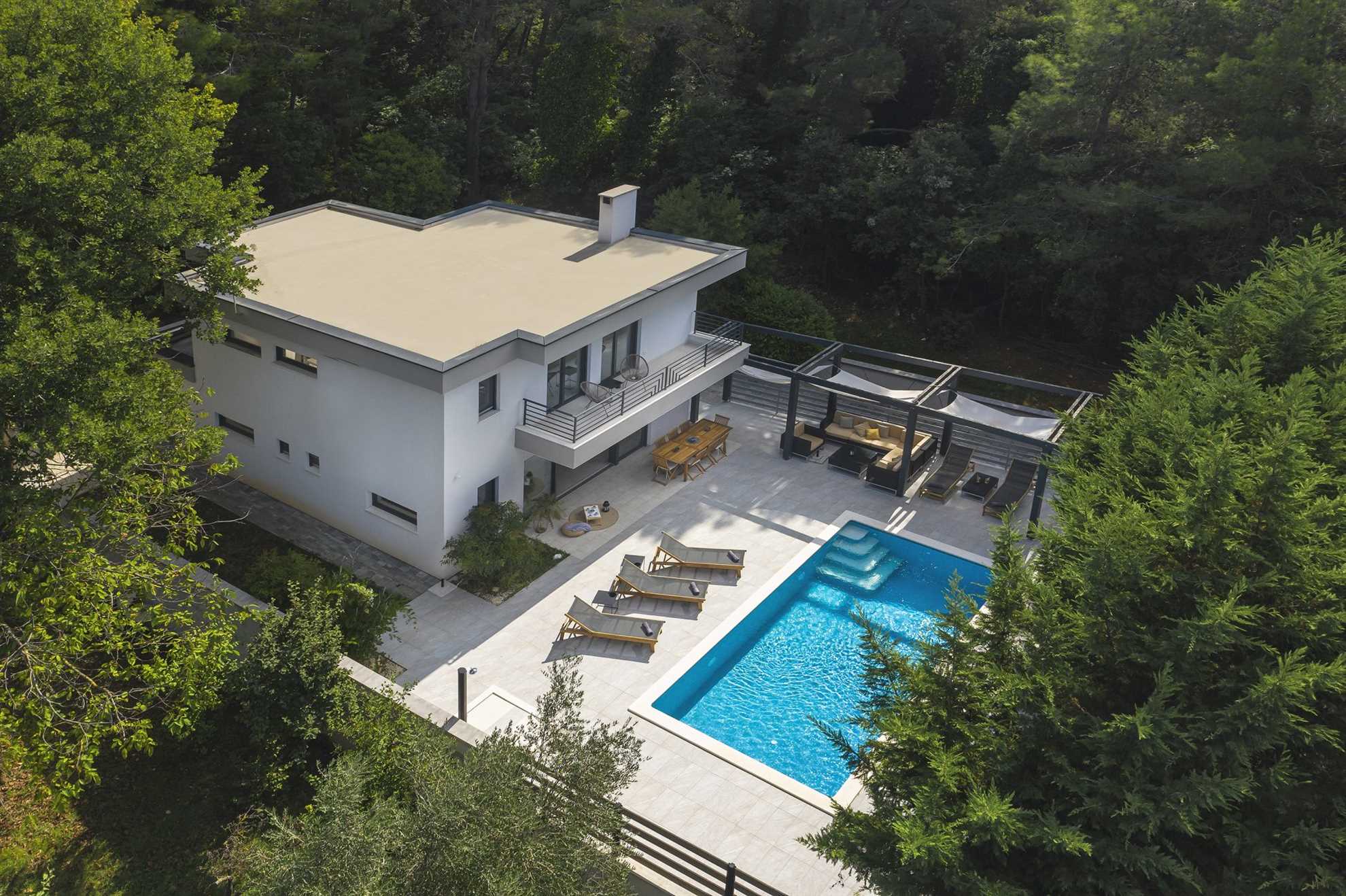 Elegant poolside villa in a pine forest in Banjole