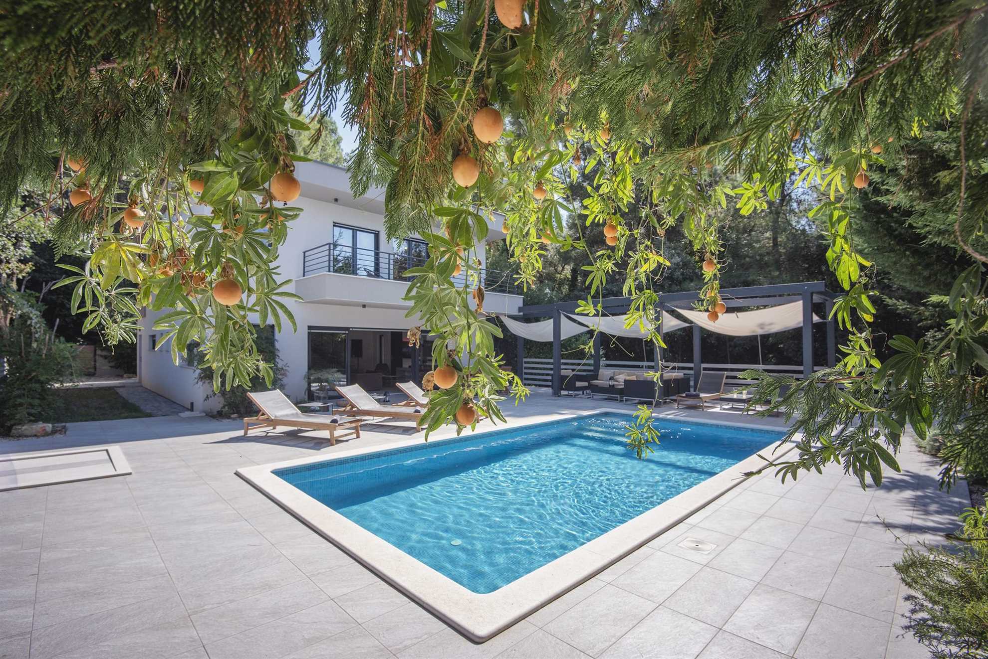 Elegant poolside villa in a pine forest in Banjole
