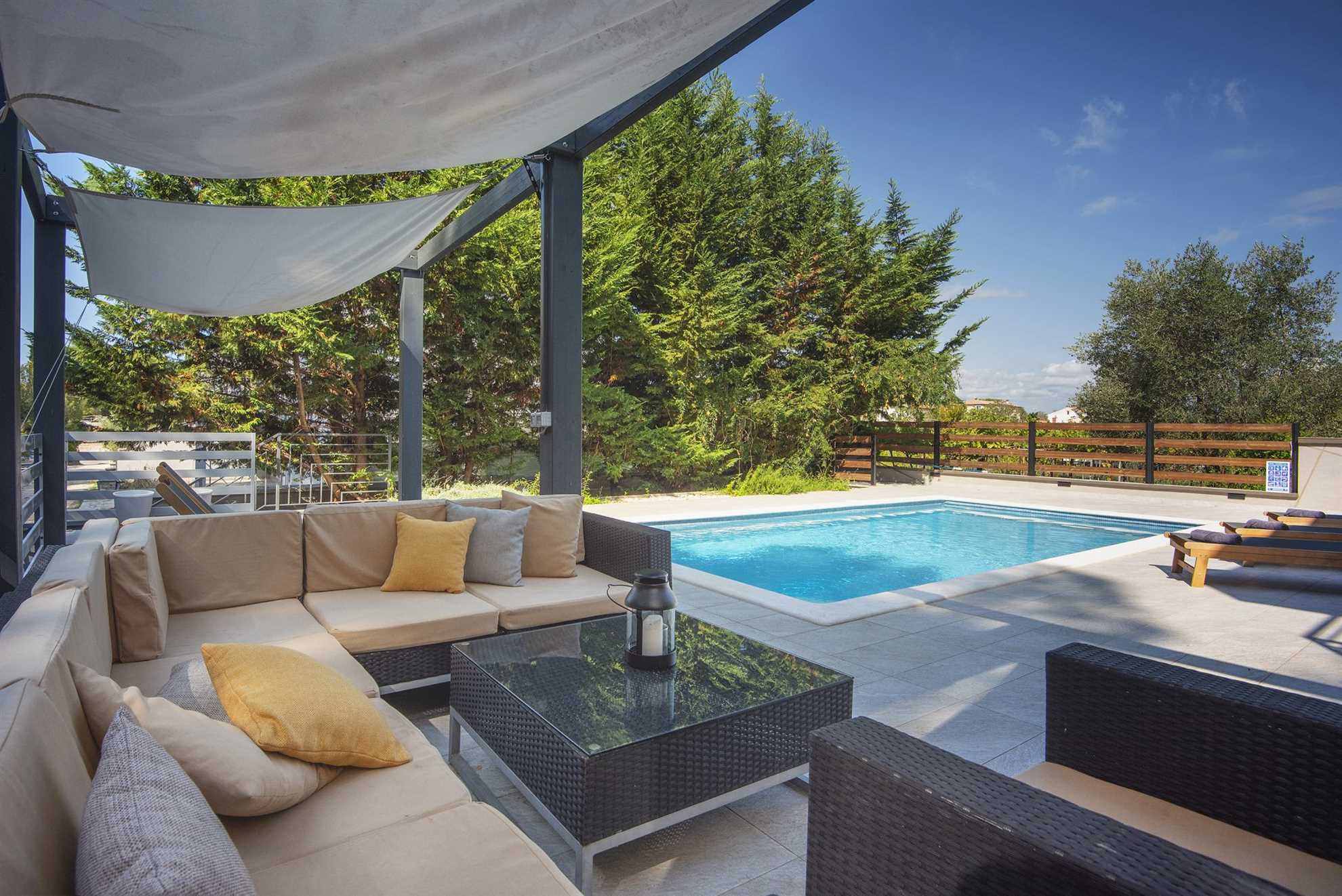 Elegant poolside villa in a pine forest in Banjole