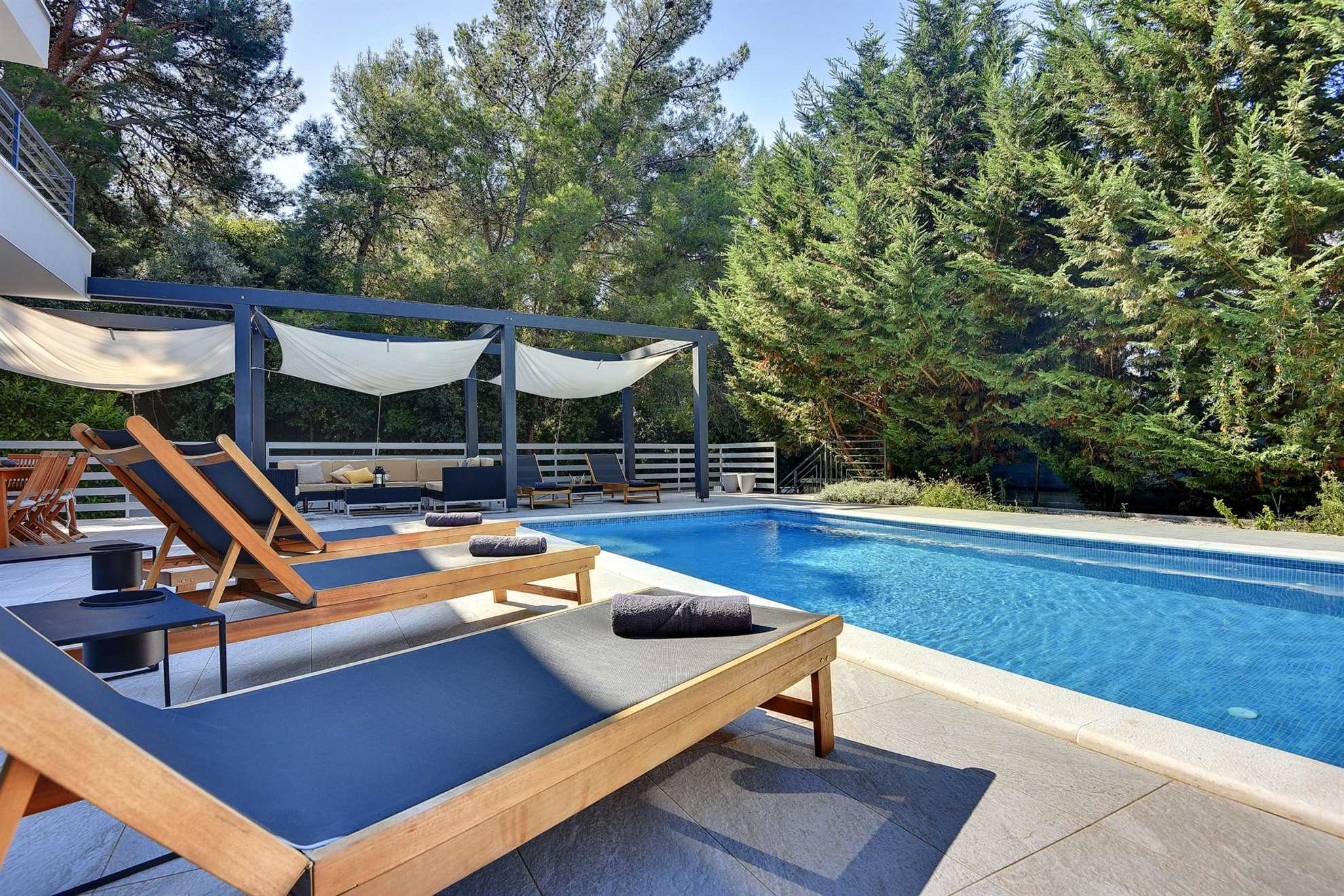 Elegant poolside villa in a pine forest in Banjole