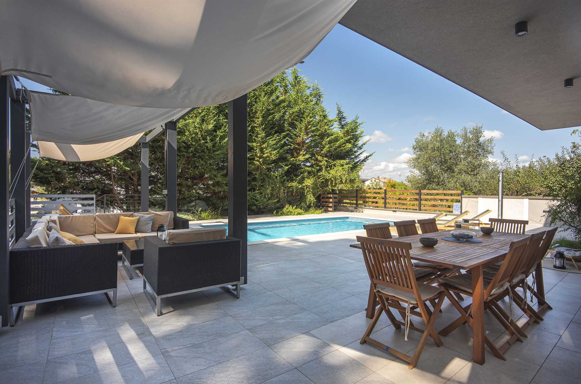 Elegant poolside villa in a pine forest in Banjole