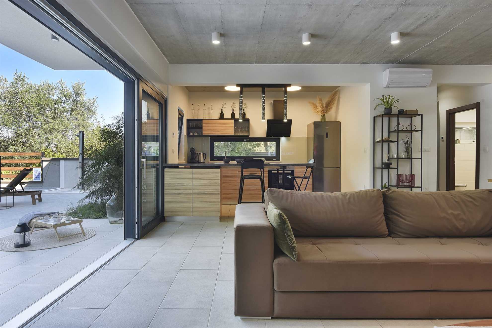 Elegant poolside villa in a pine forest in Banjole