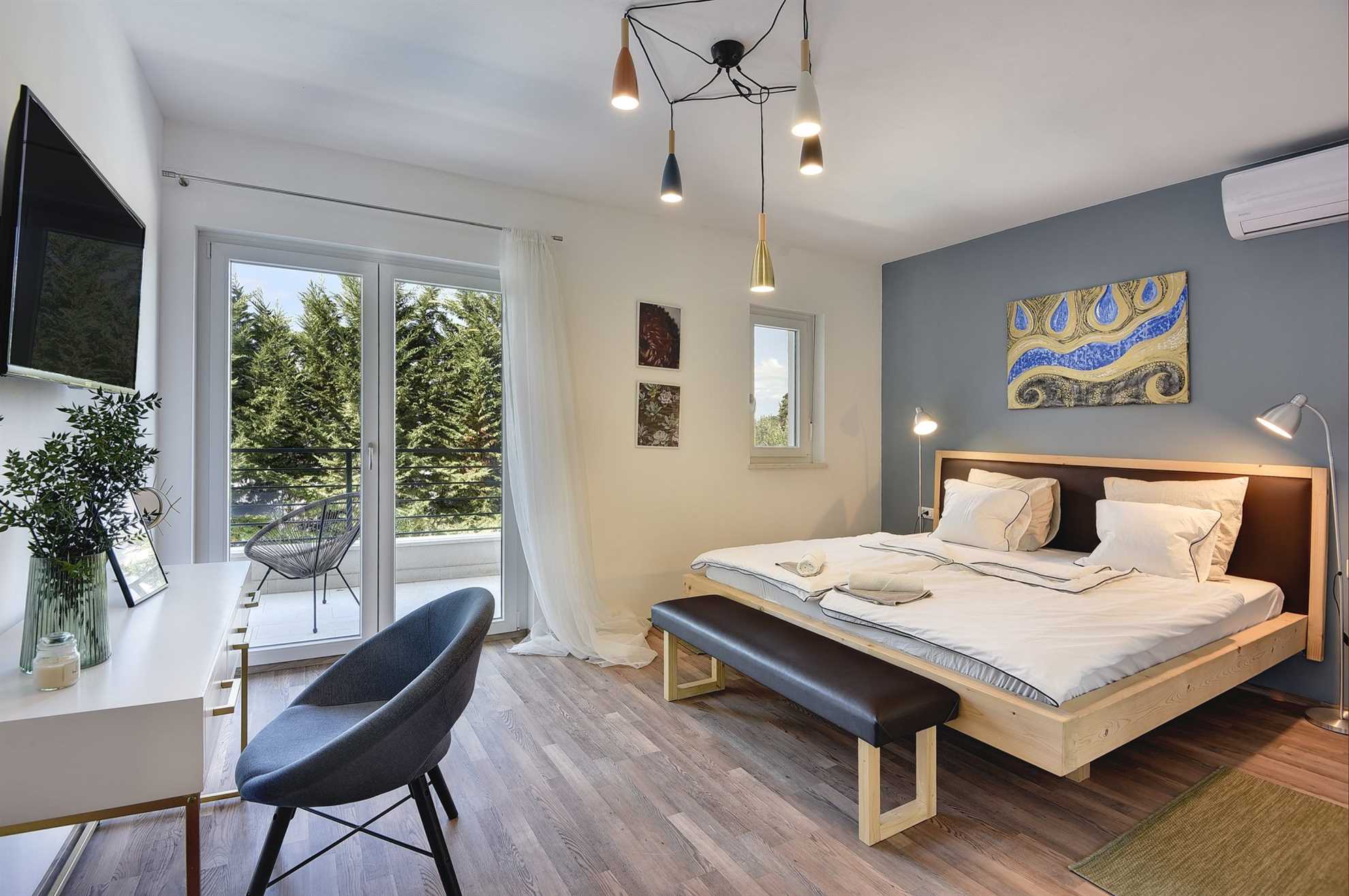 Elegant poolside villa in a pine forest in Banjole