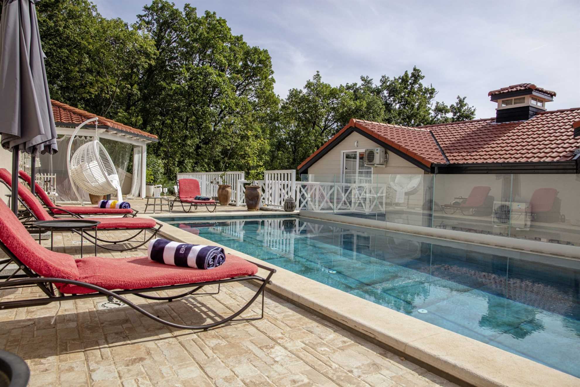 A charming holiday home in Veprinac with a swimming pool