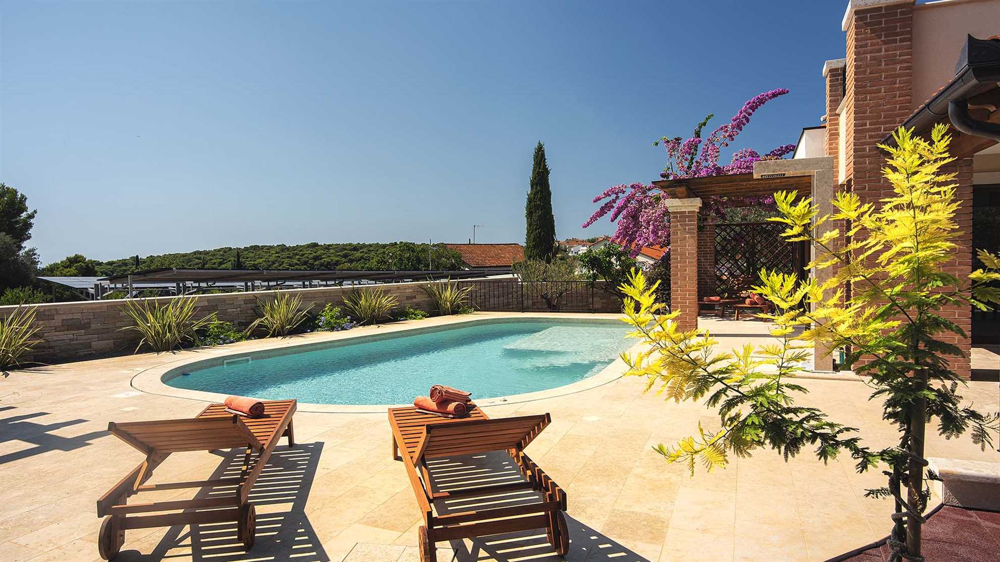 A modern, poolside villa in Premantura, Istria