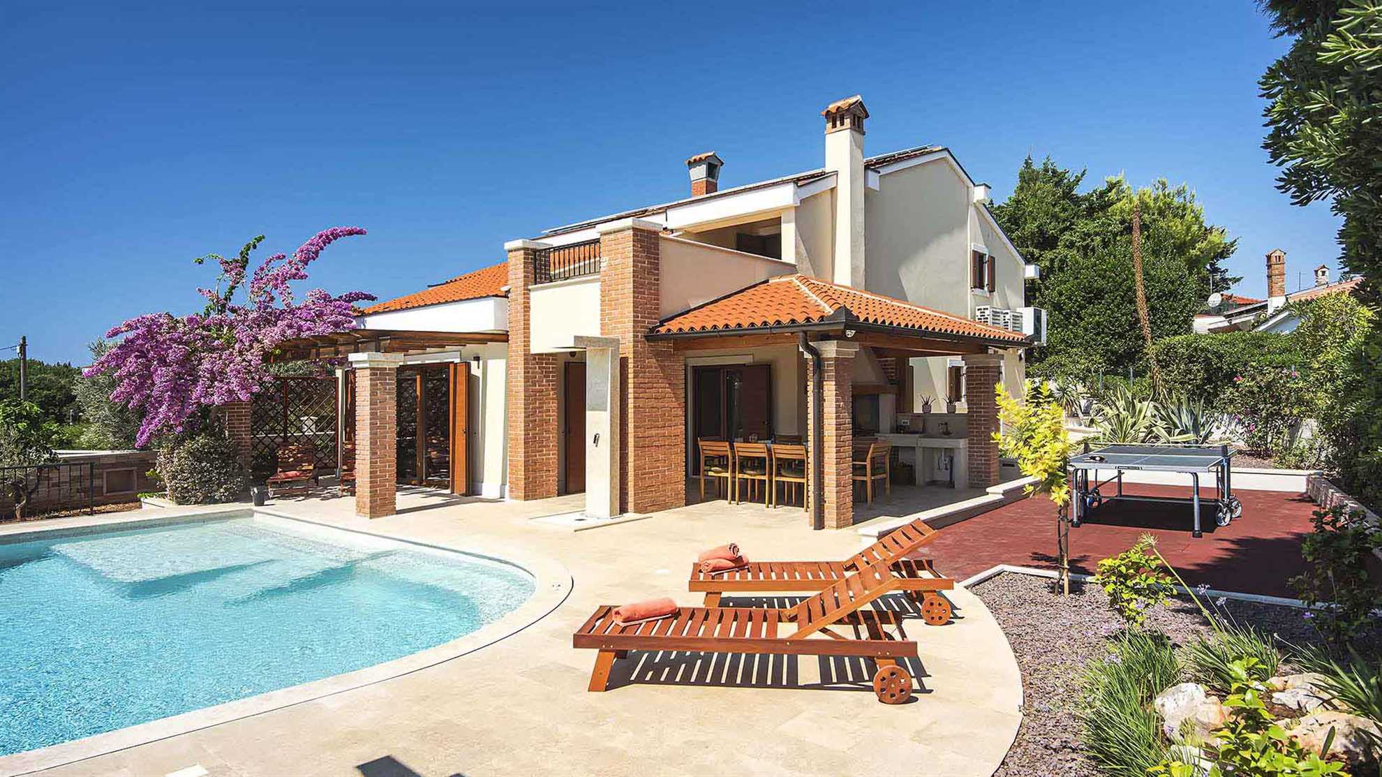 A modern, poolside villa in Premantura, Istria