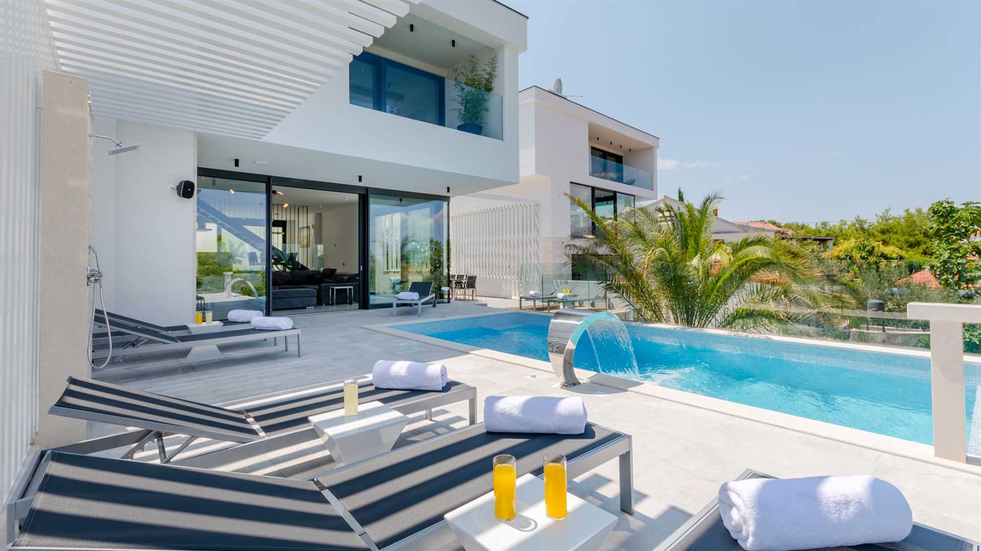 Luxury beachfront villa with pool in Sutivan