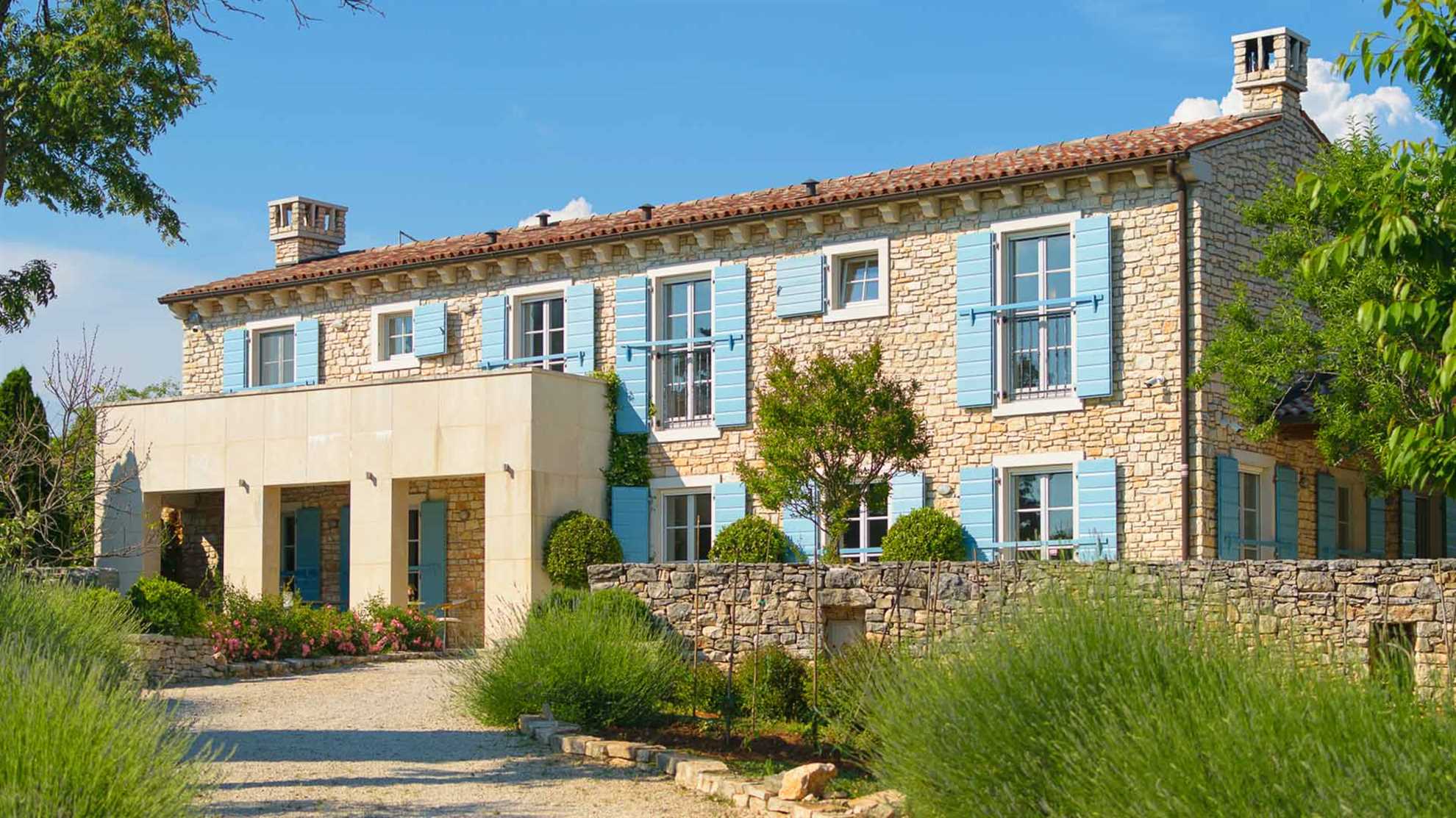 A traditional, stone villa in Marčana with a pool and children's playground