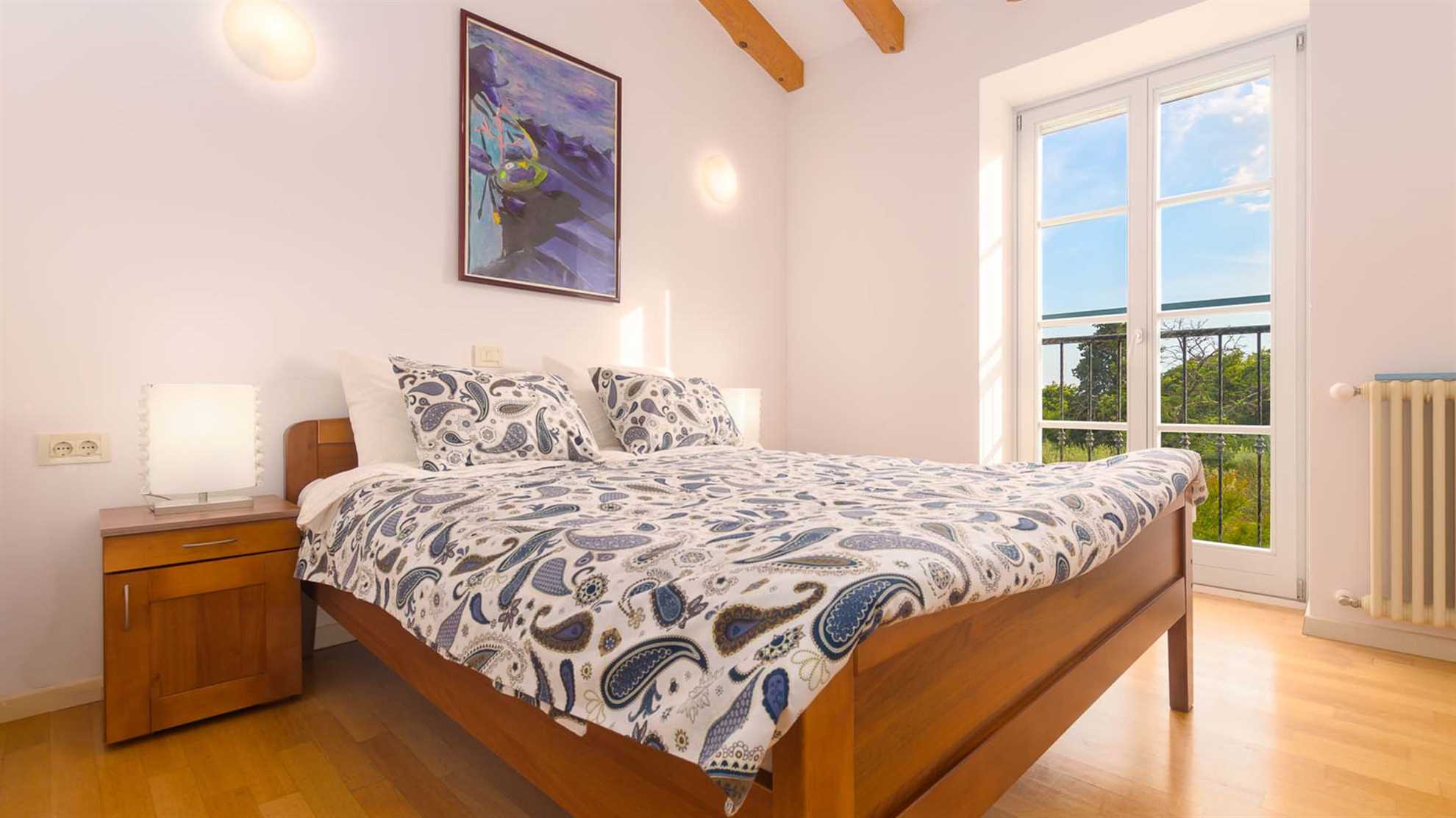 A traditional, stone villa in Marčana with a pool and children's playground