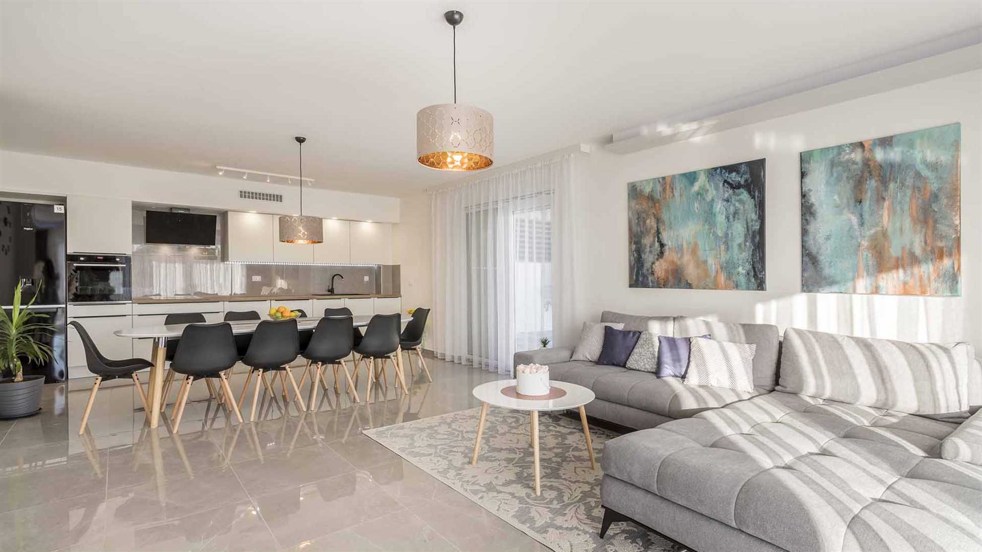 A modern villa in Podstrana with a pool