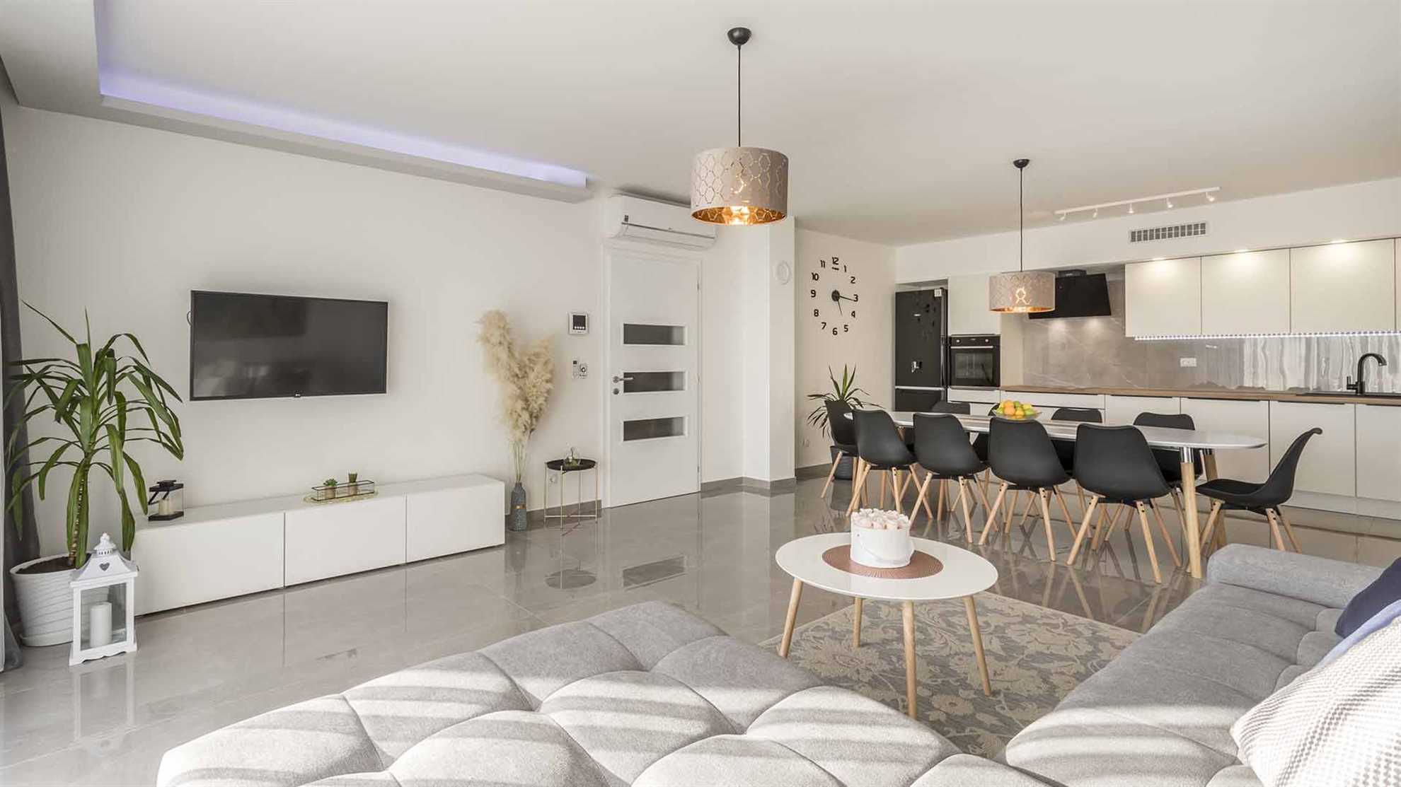 A modern villa in Podstrana with a pool