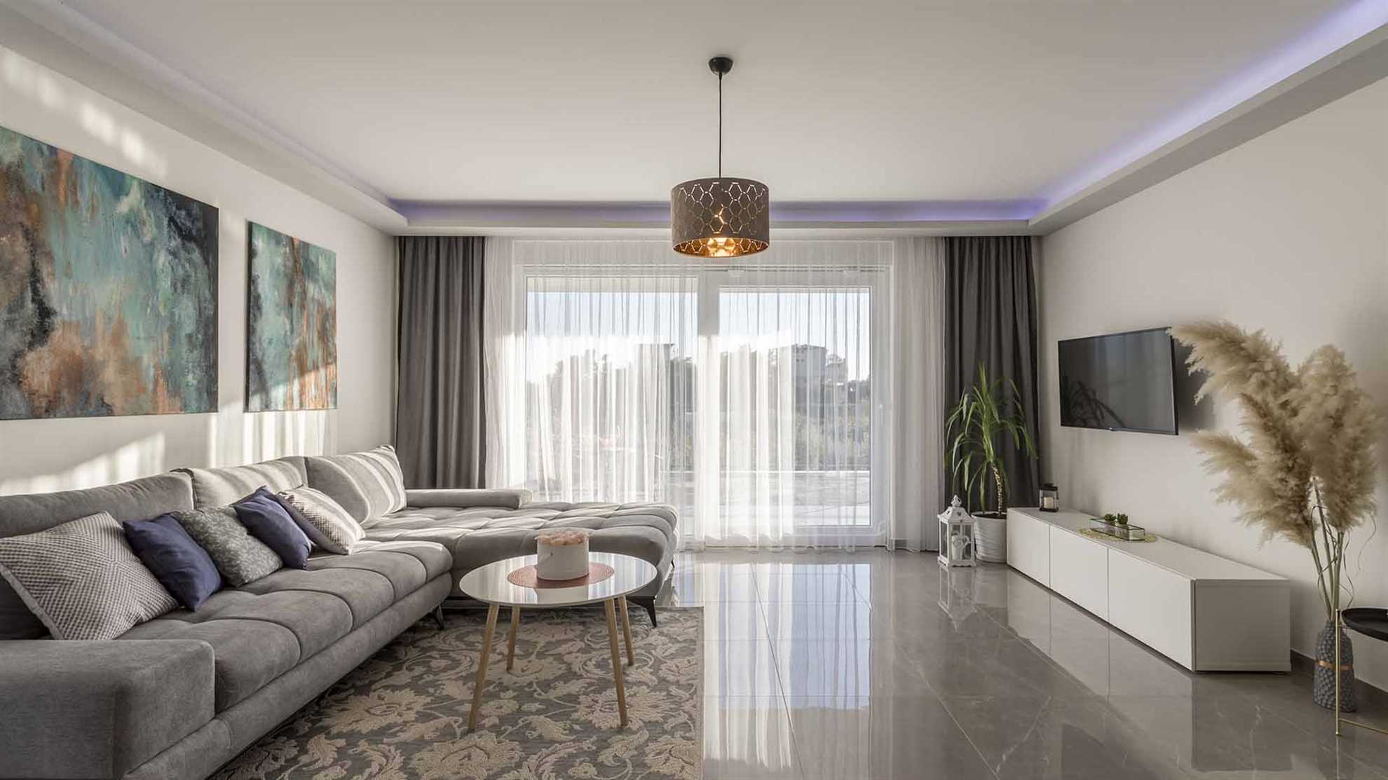 A modern villa in Podstrana with a pool