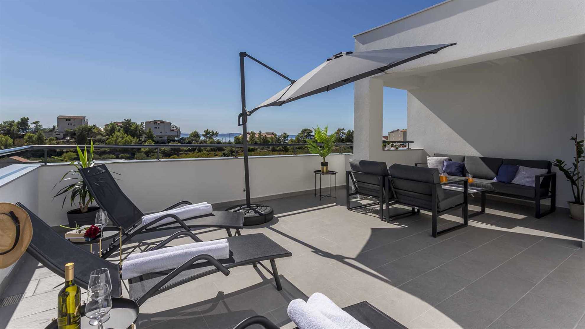 A modern villa in Podstrana with a pool