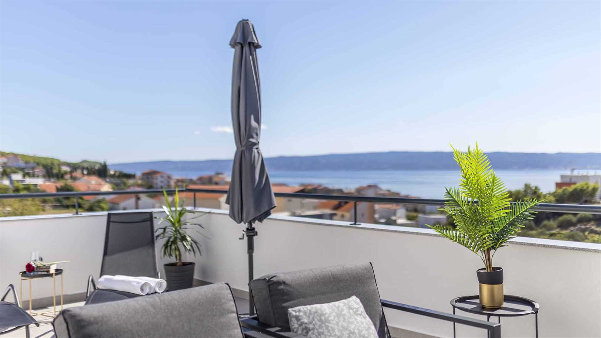 A modern villa in Podstrana with a pool