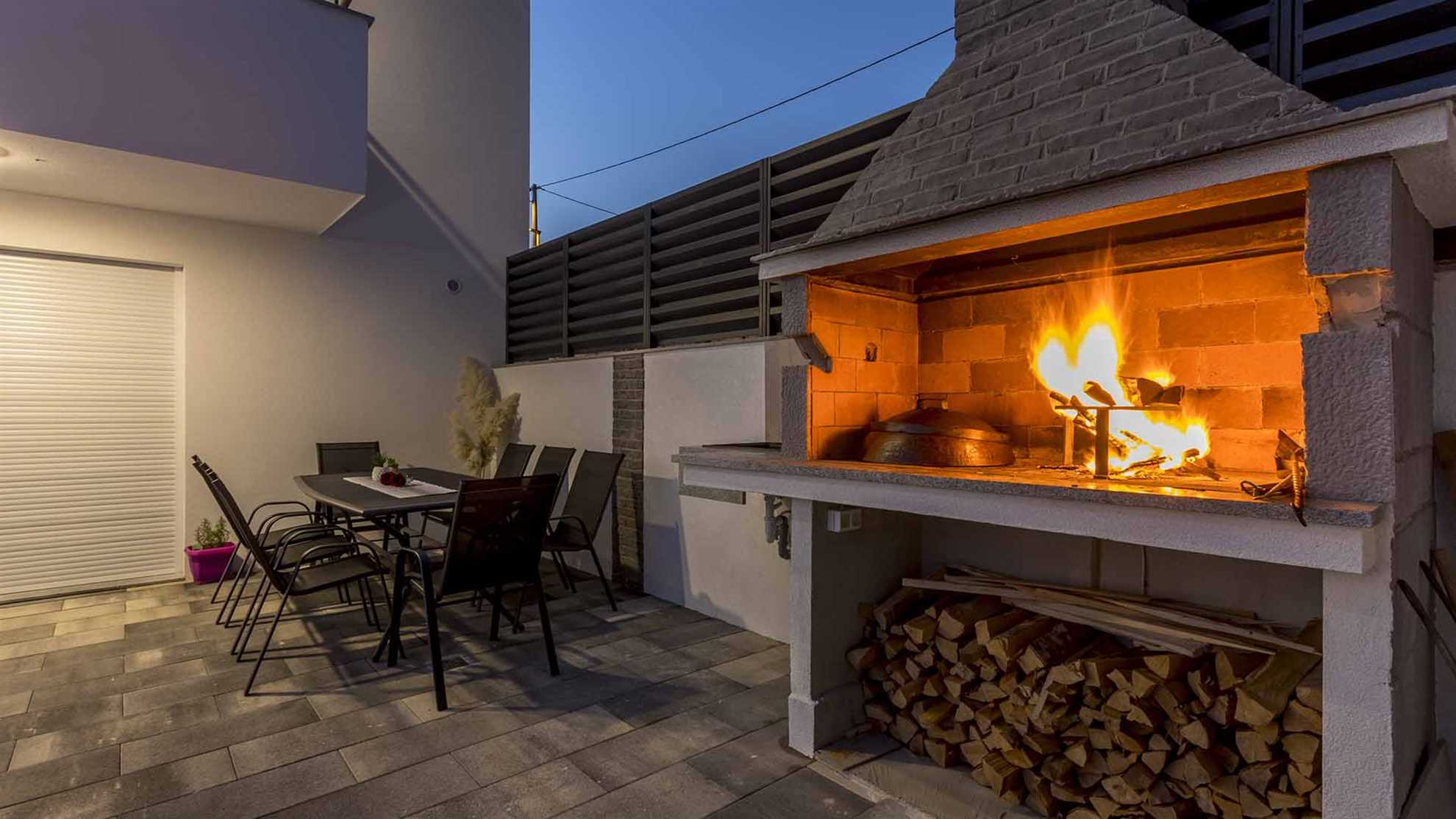 A modern villa in Podstrana with a pool