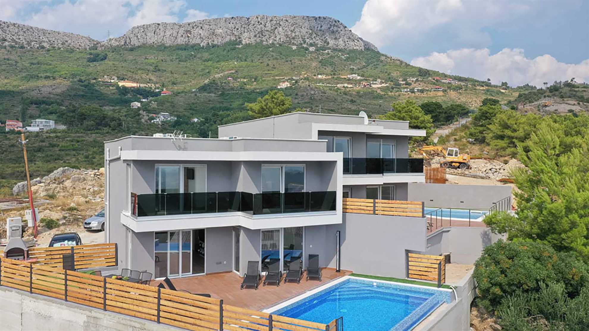 A modern poolside villa on Klis, Split with a swimming pool