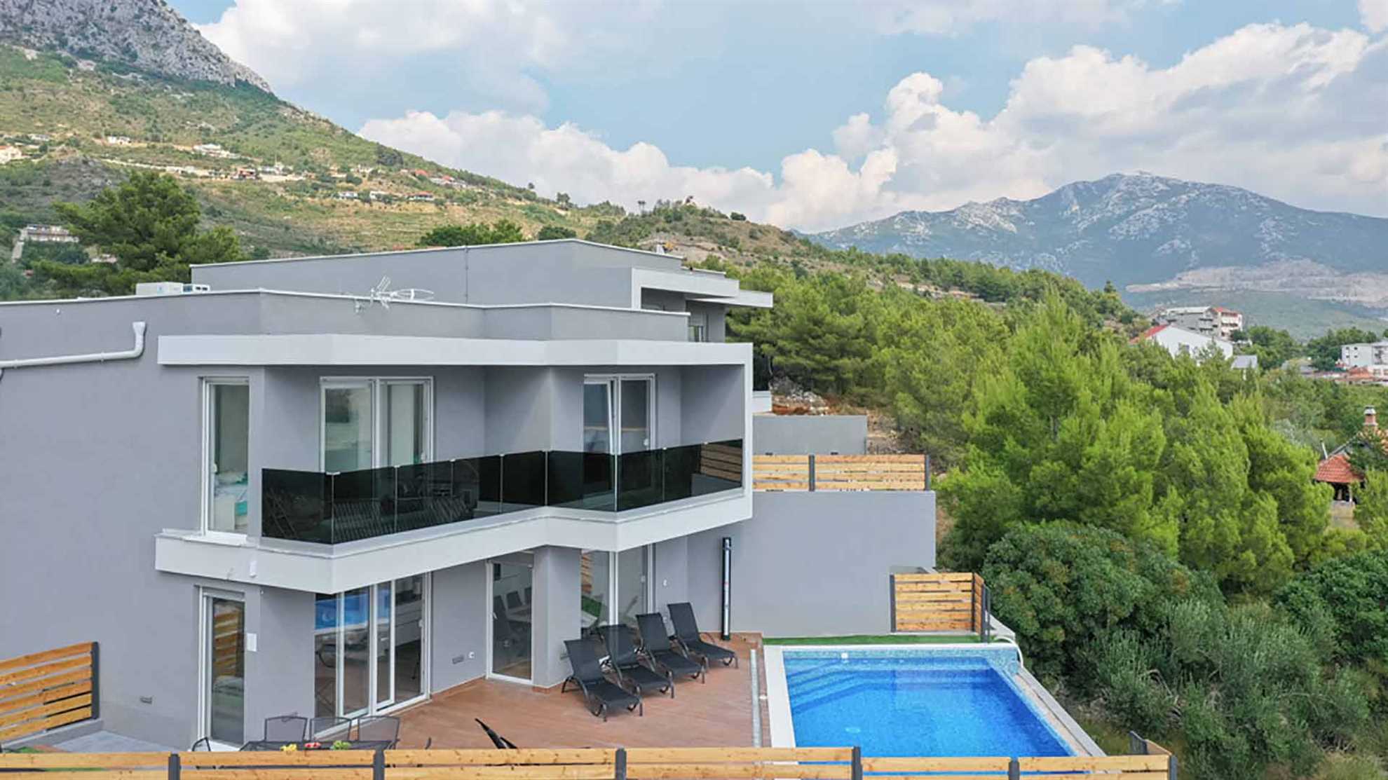 A modern poolside villa on Klis, Split with a swimming pool