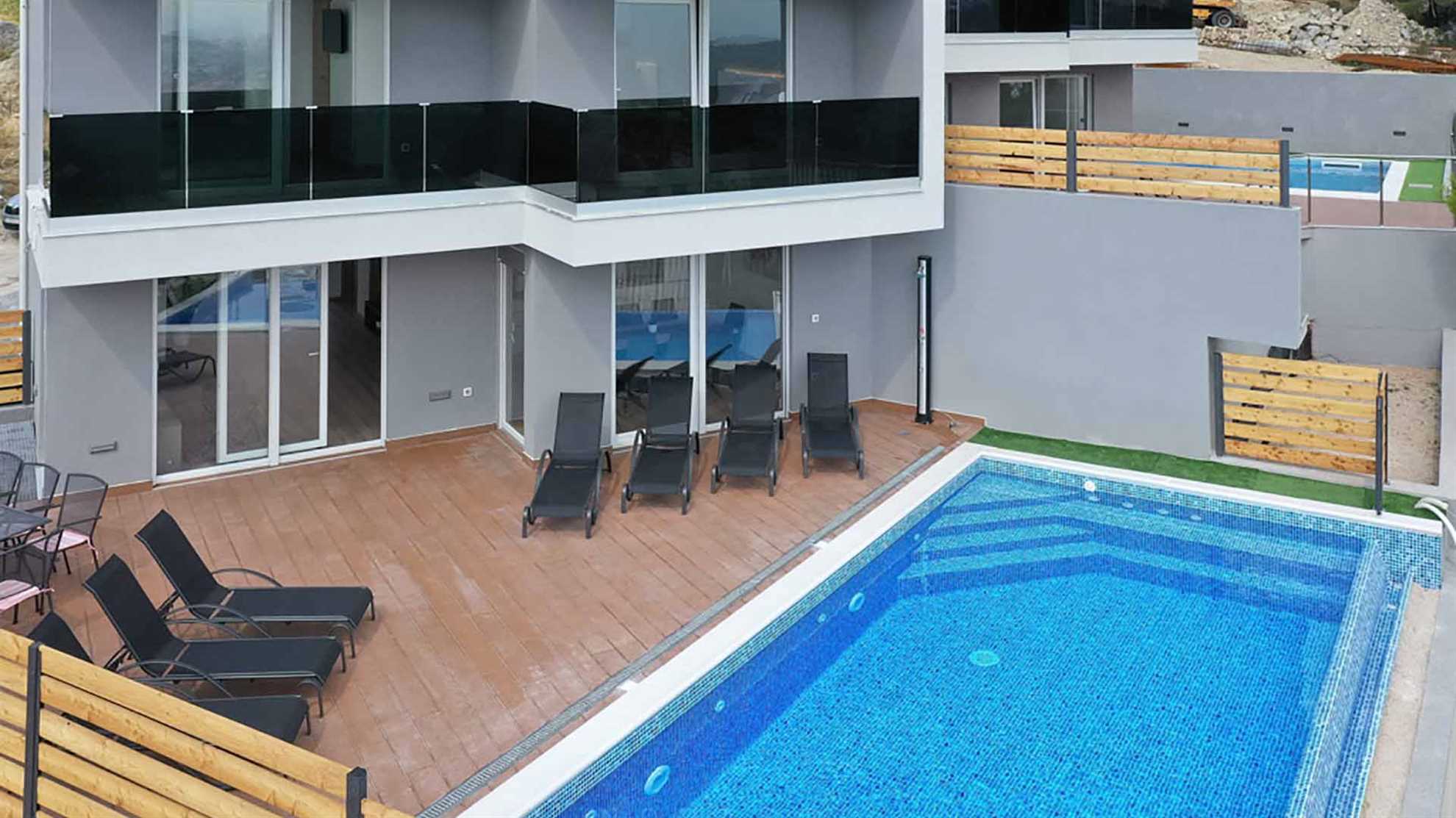 A modern poolside villa on Klis, Split with a swimming pool