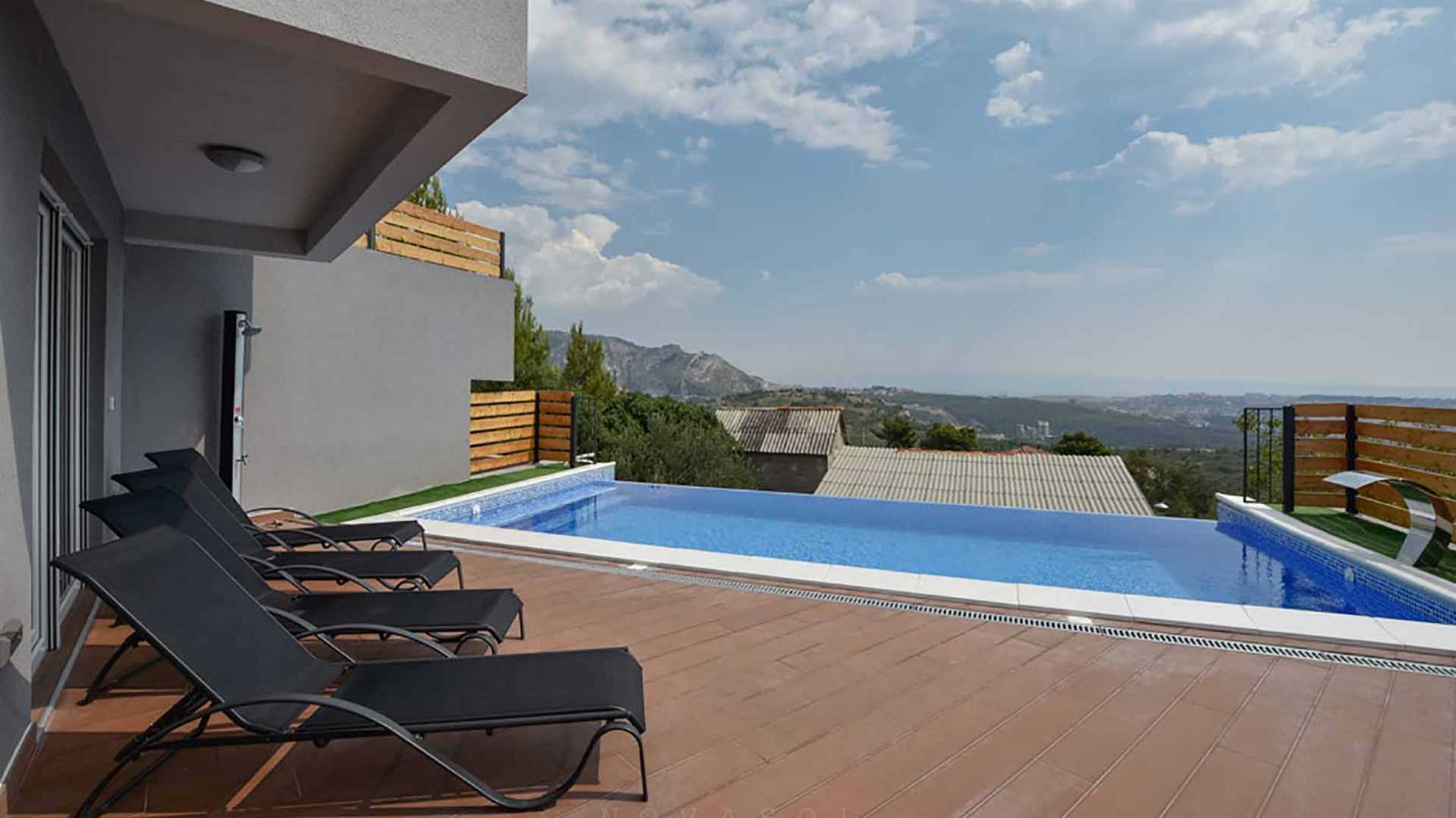 A modern poolside villa on Klis, Split with a swimming pool