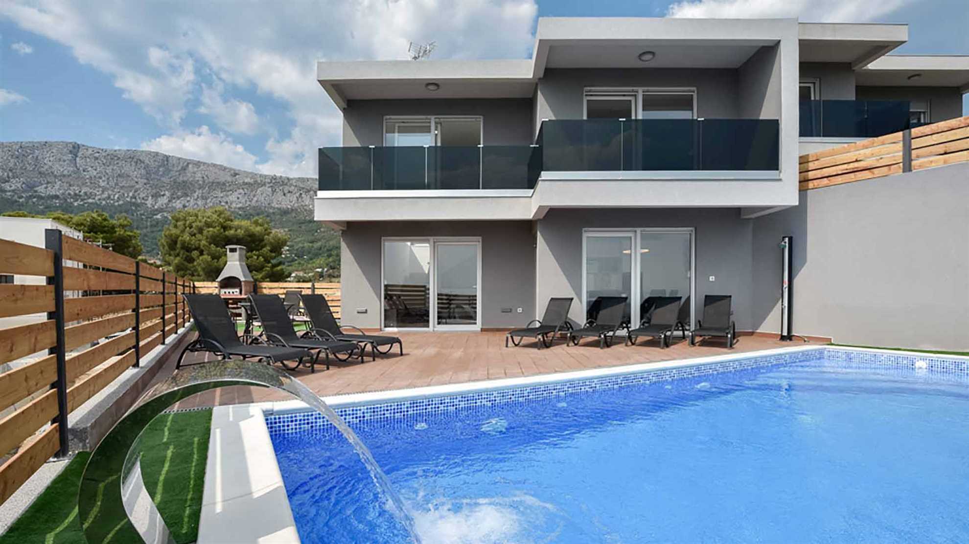 A modern poolside villa on Klis, Split with a swimming pool