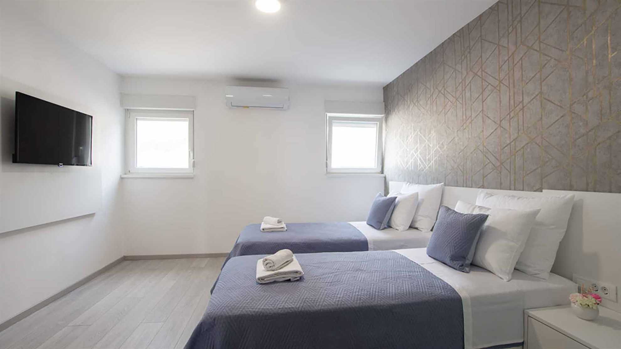 A modern, poolside complex on Klis with a stunning view on Split