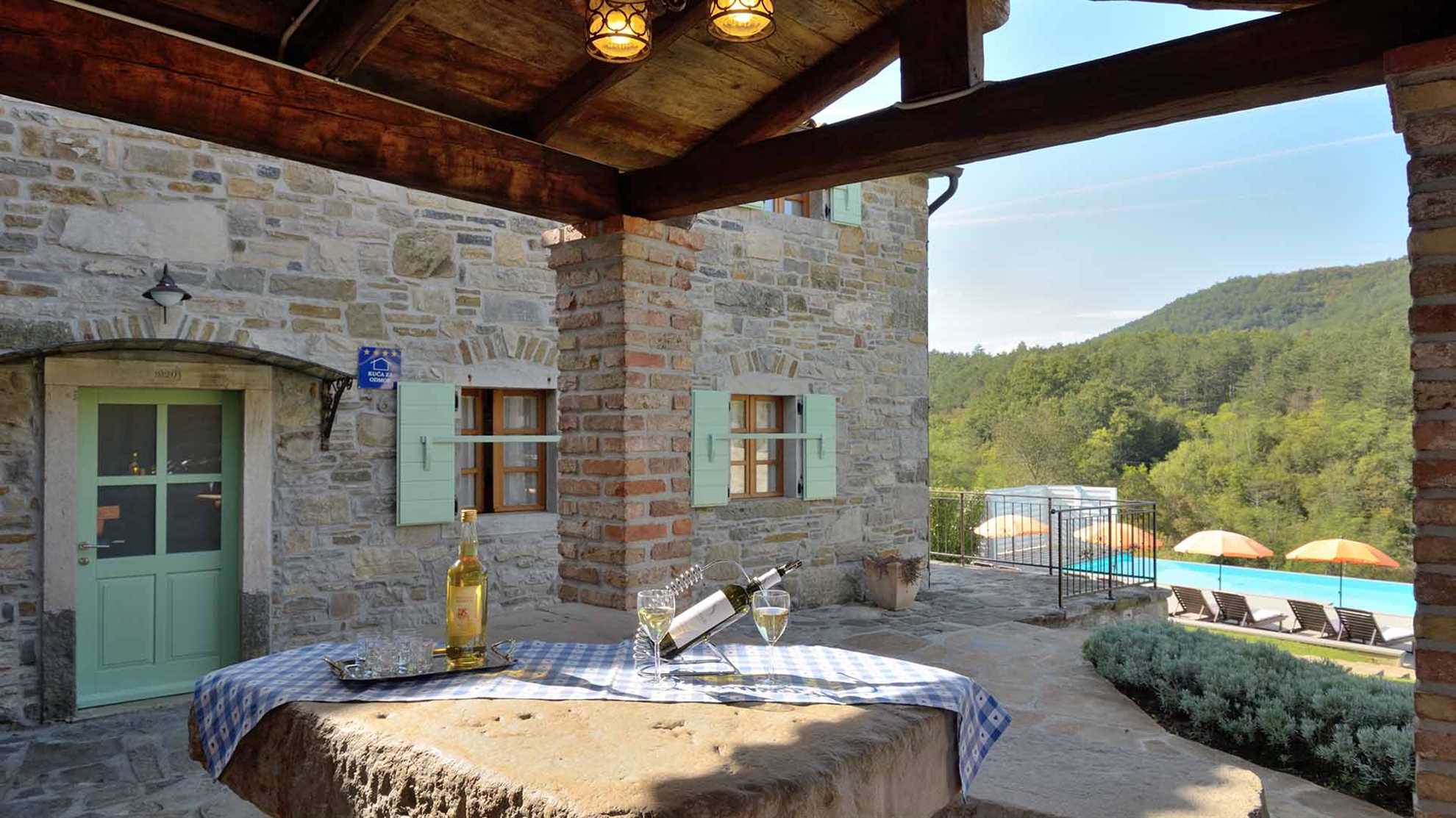 Estate with four stone villas and swimming pool