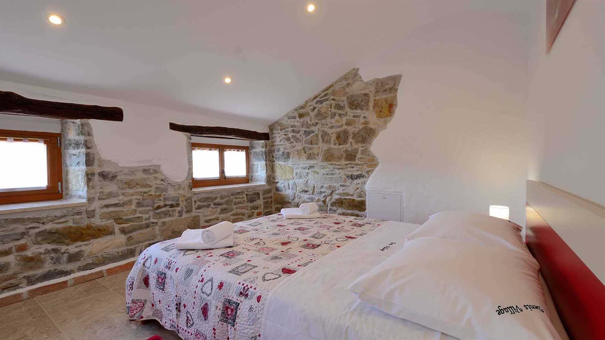 Estate with four stone villas and swimming pool