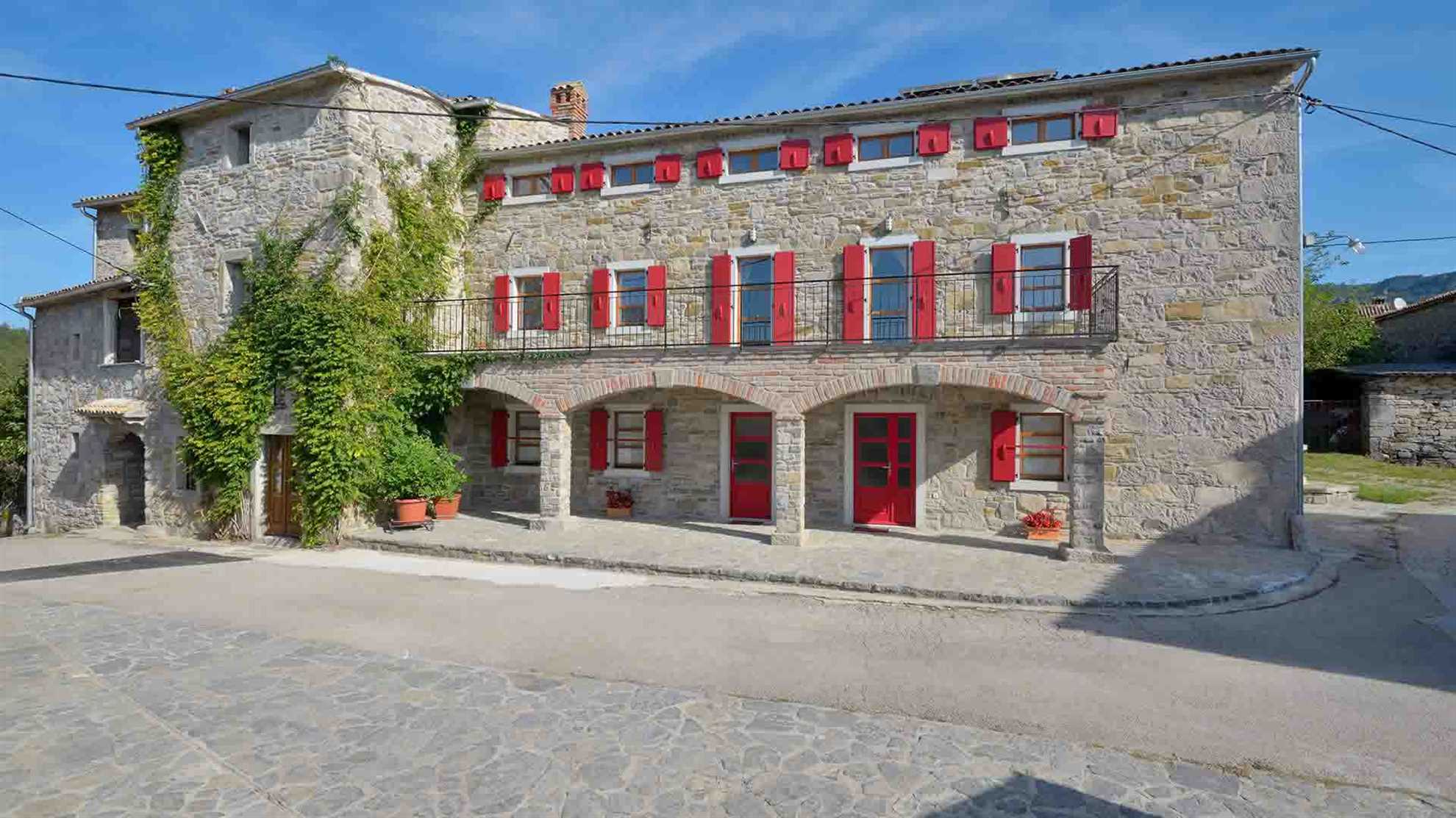 Estate with four stone villas and swimming pool