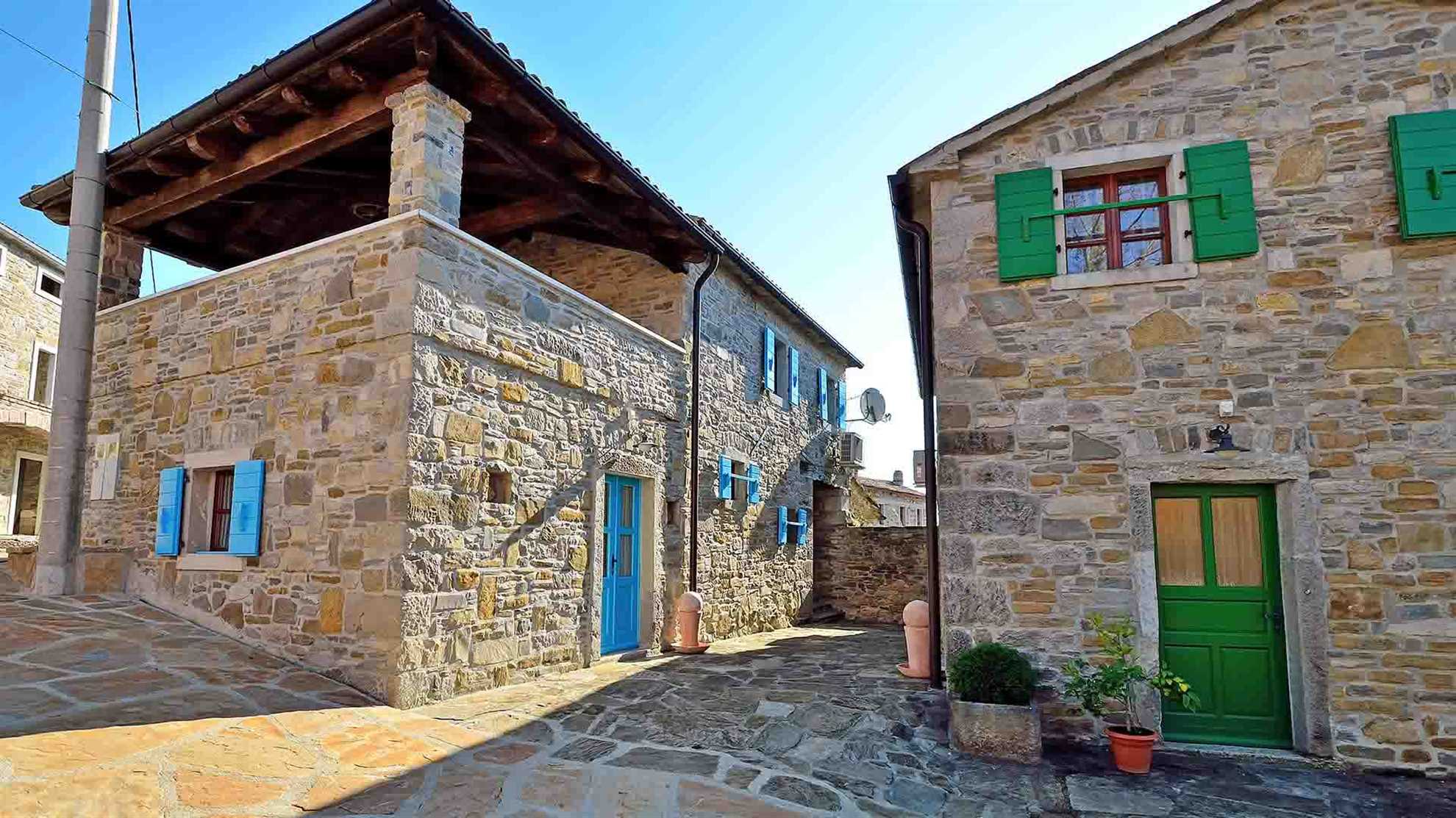 Estate with four stone villas and swimming pool