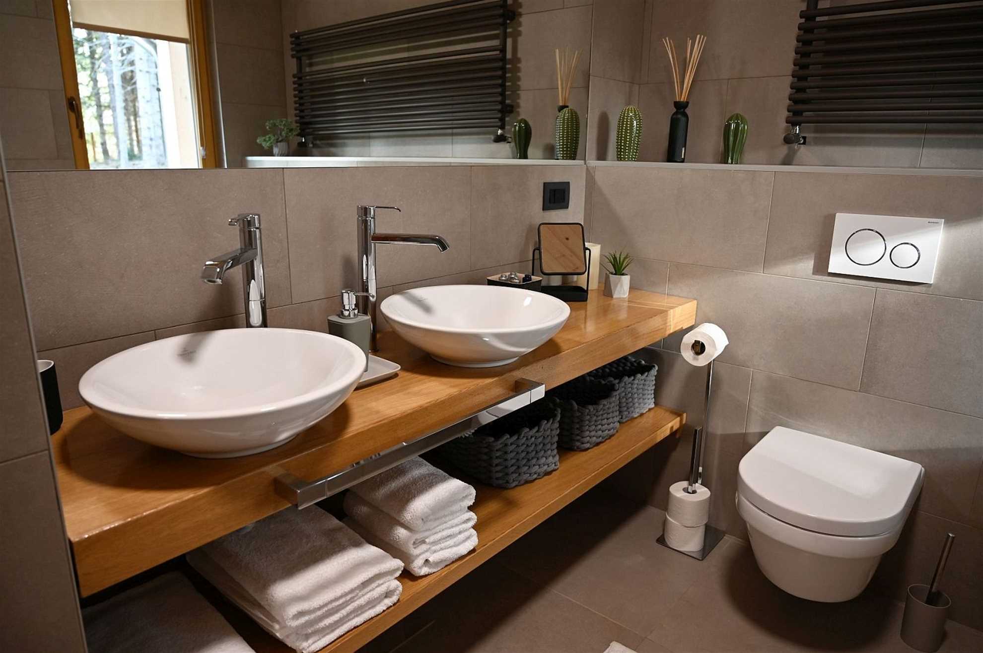 A luxury mountain cabin in Stari Laz featuring a finnish sauna