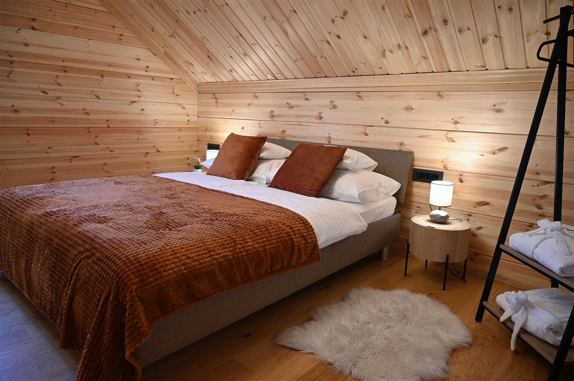 A luxury mountain cabin in Stari Laz featuring a finnish sauna