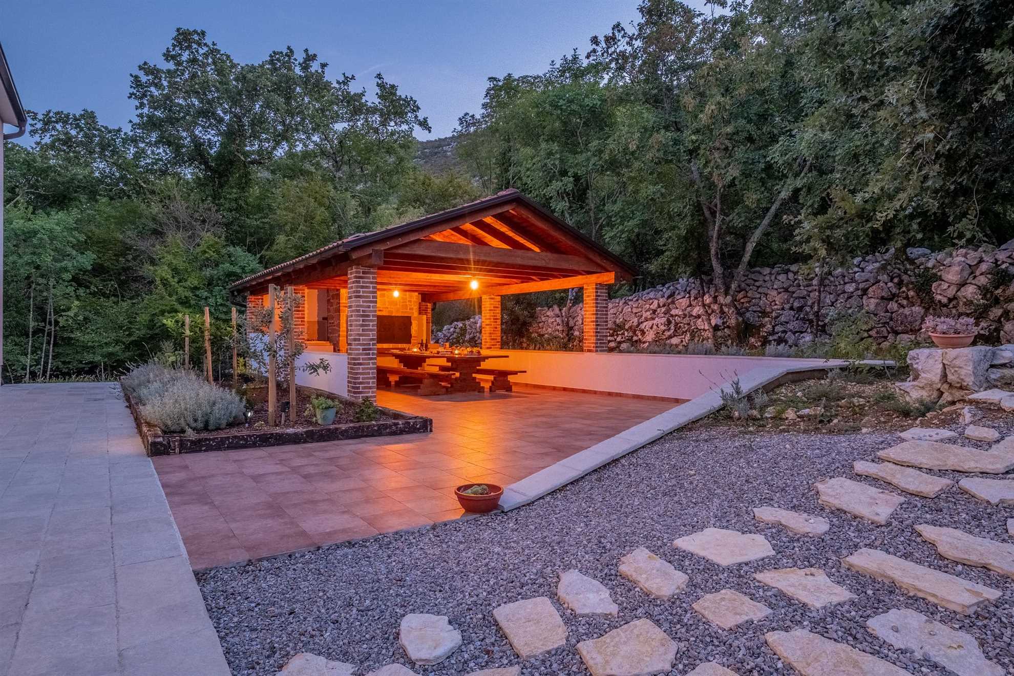 Traditional poolside villa surrounded by nature