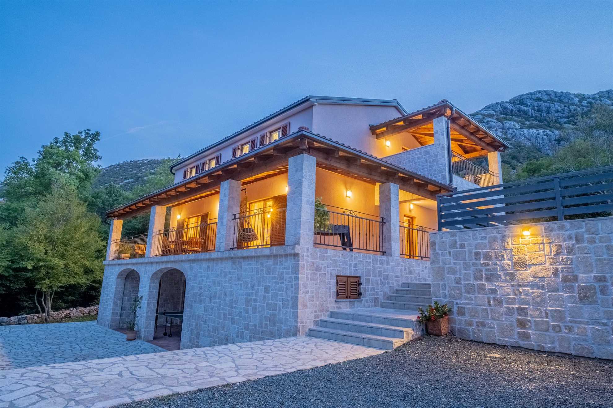 Traditional poolside villa surrounded by nature