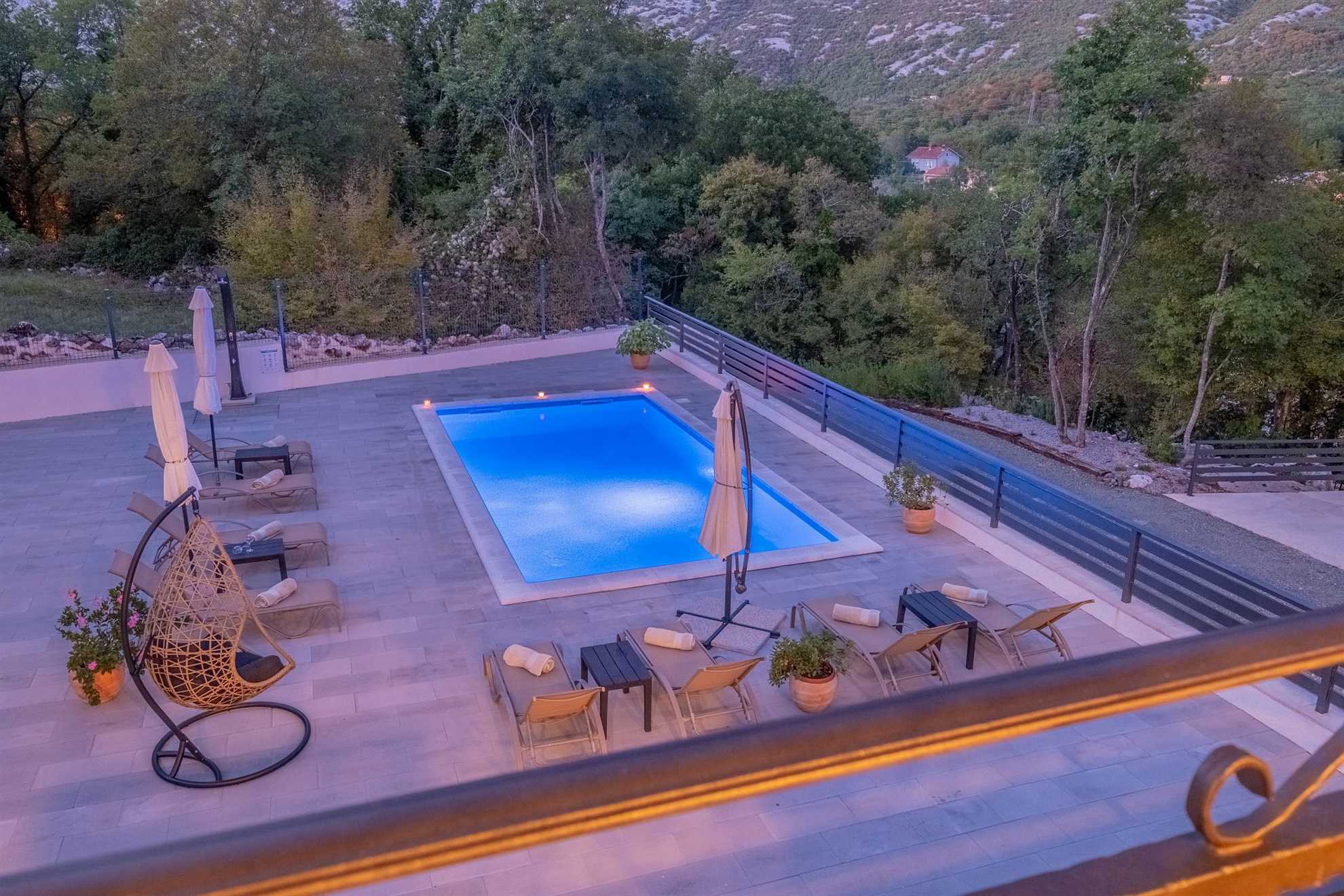 Traditional poolside villa surrounded by nature