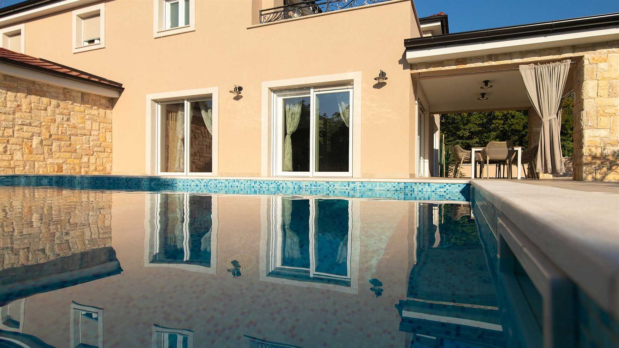 A modern poolside villa on the island Krk