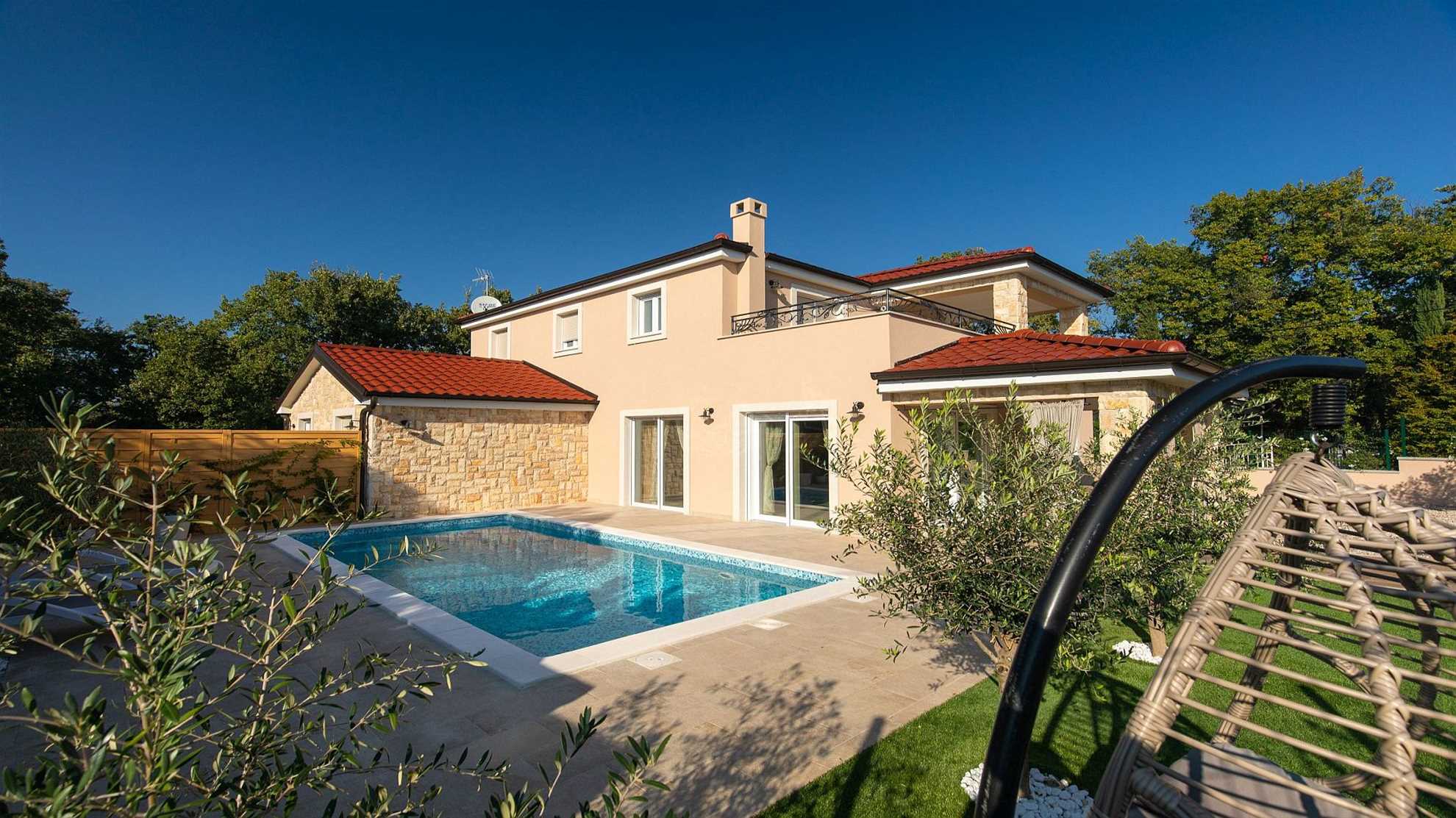 A modern poolside villa on the island Krk