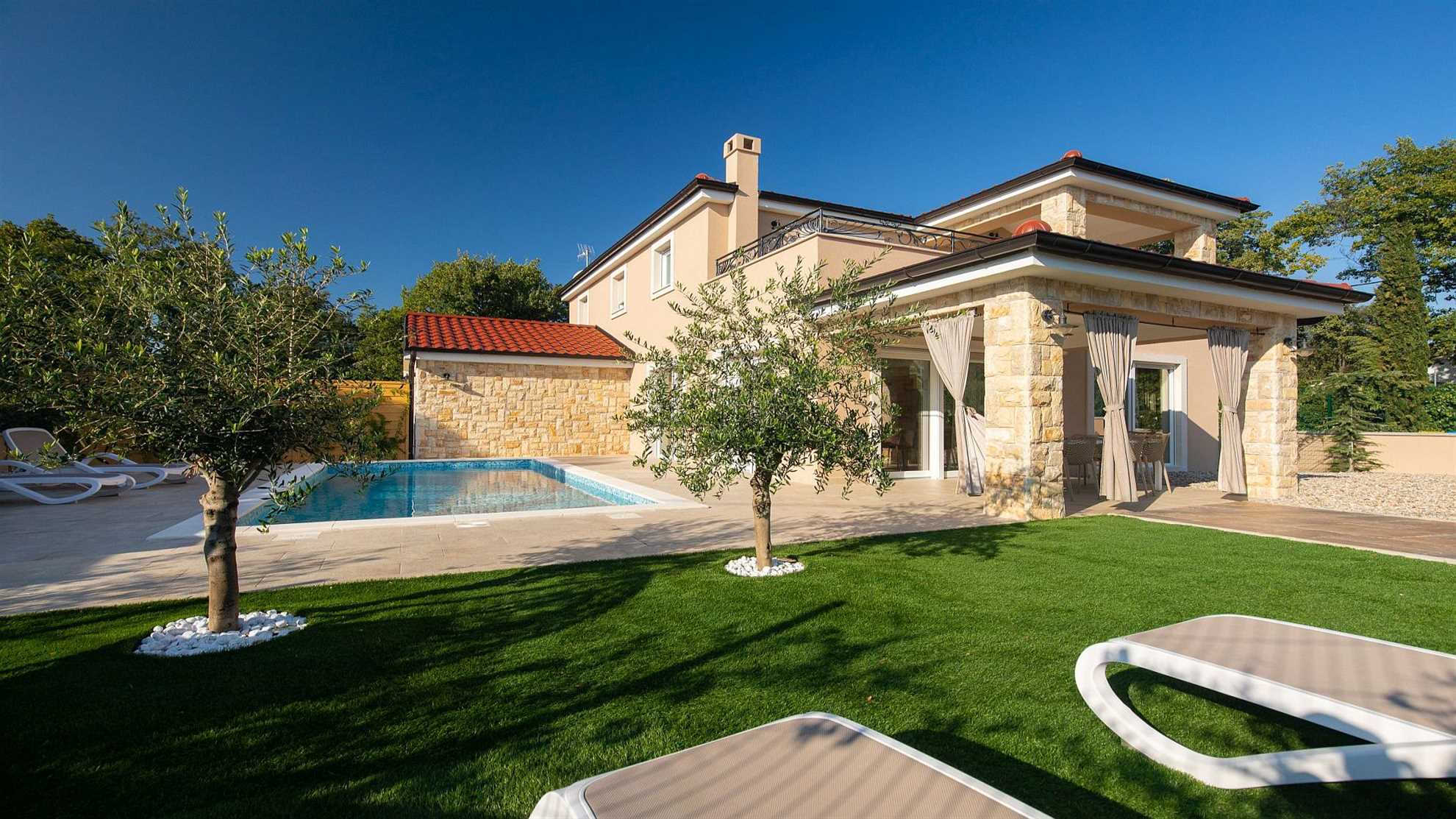 A modern poolside villa on the island Krk