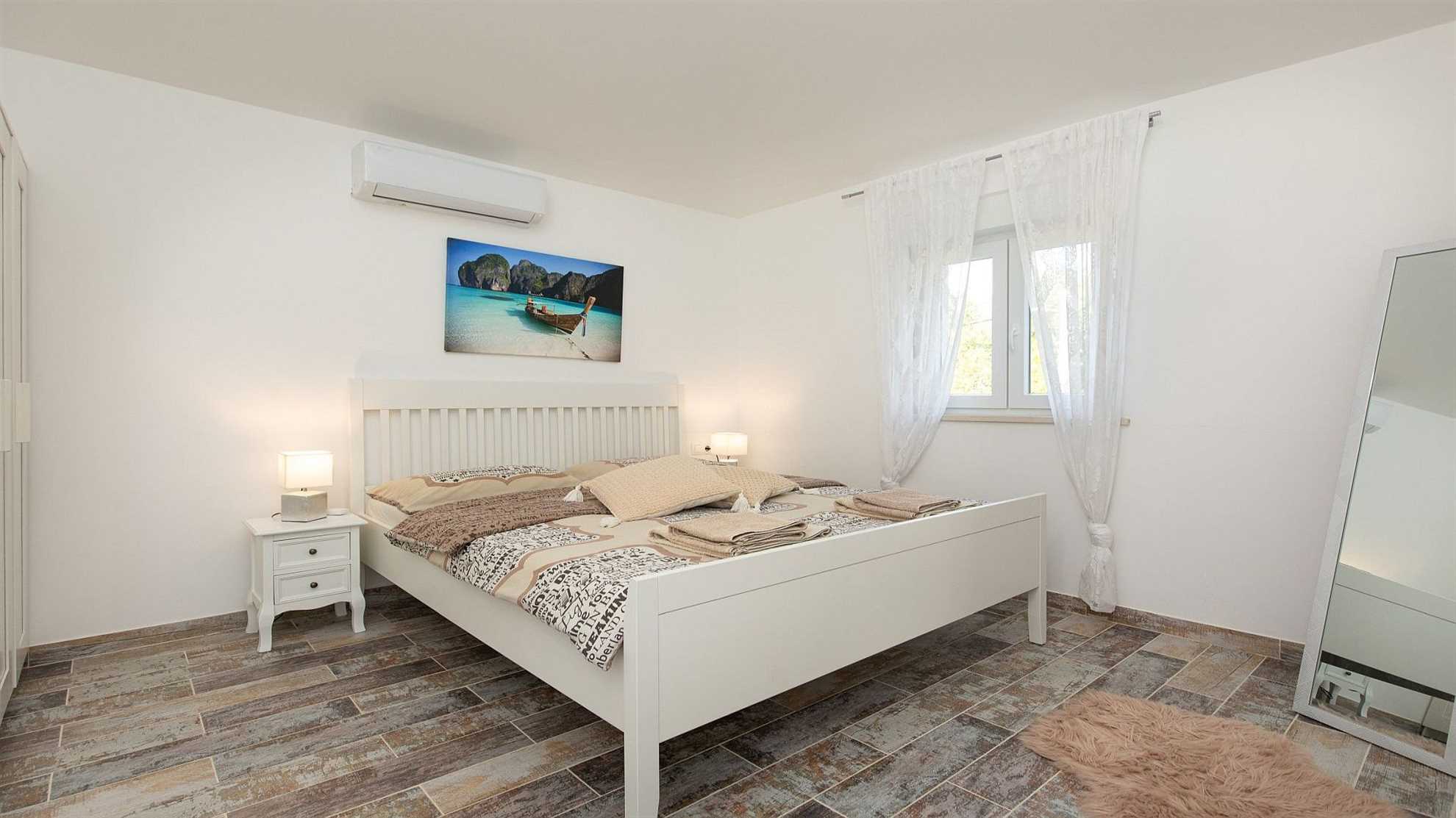 A modern poolside villa on the island Krk